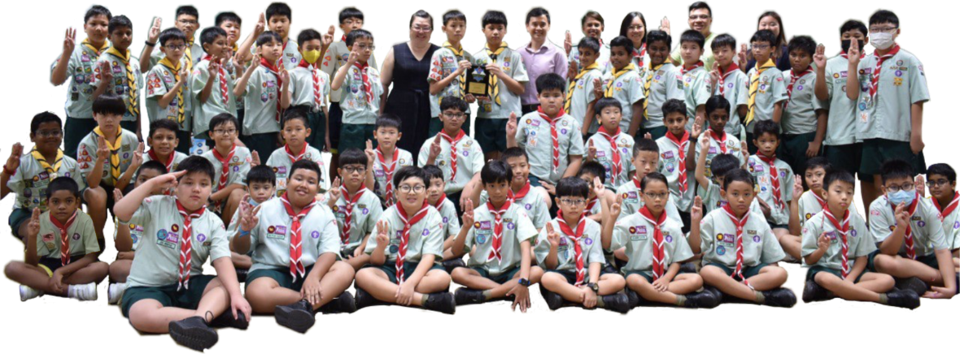 Large group of young scouts in green uniforms with red neckerchiefs posing with a trophy and scout salute.