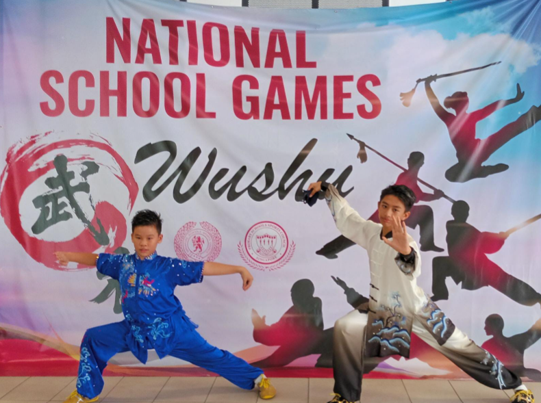 Students with wushu pose