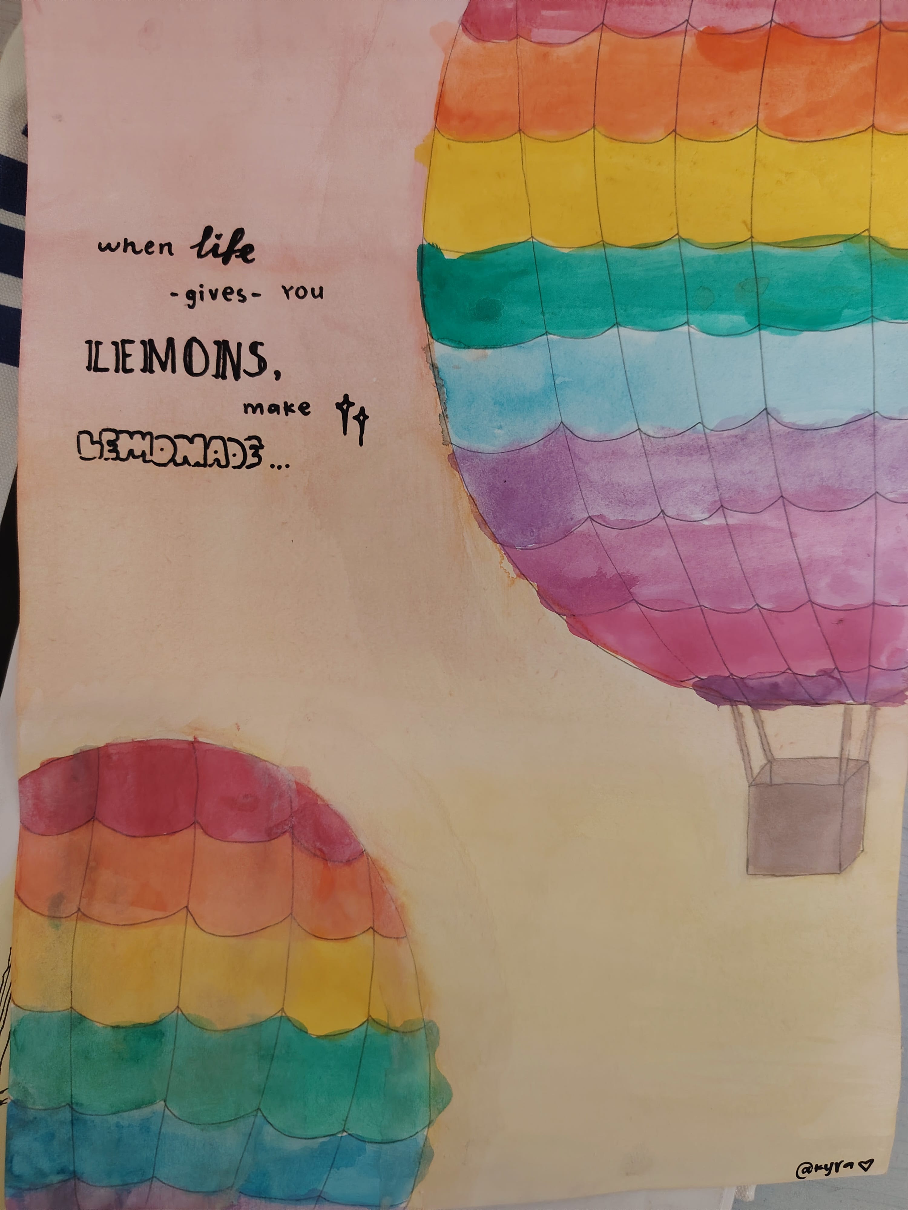 Artwork with hot air balloons and the quote "When life gives you lemons, make lemonade".
