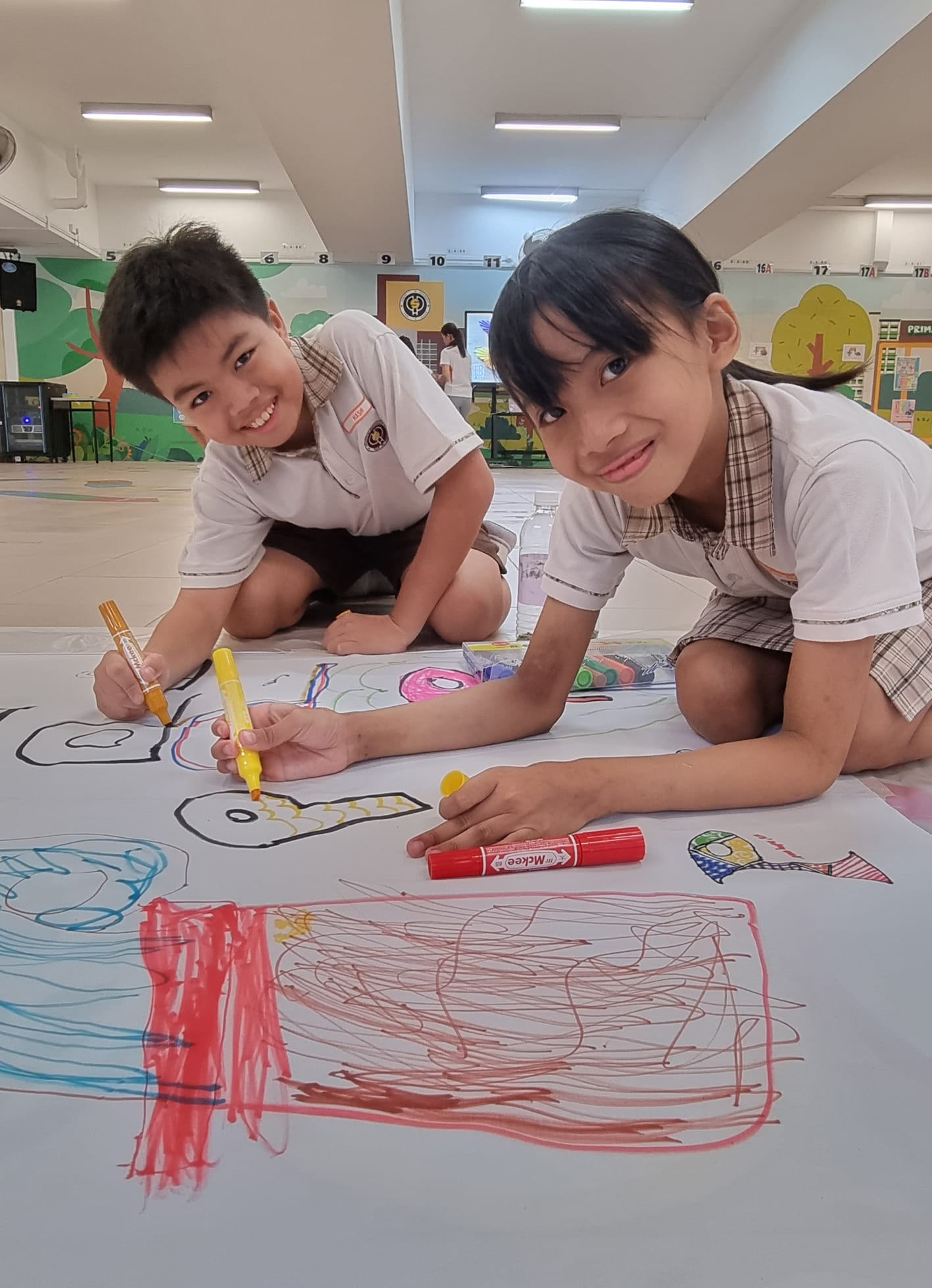 Students engaging in art and music activities during recess.