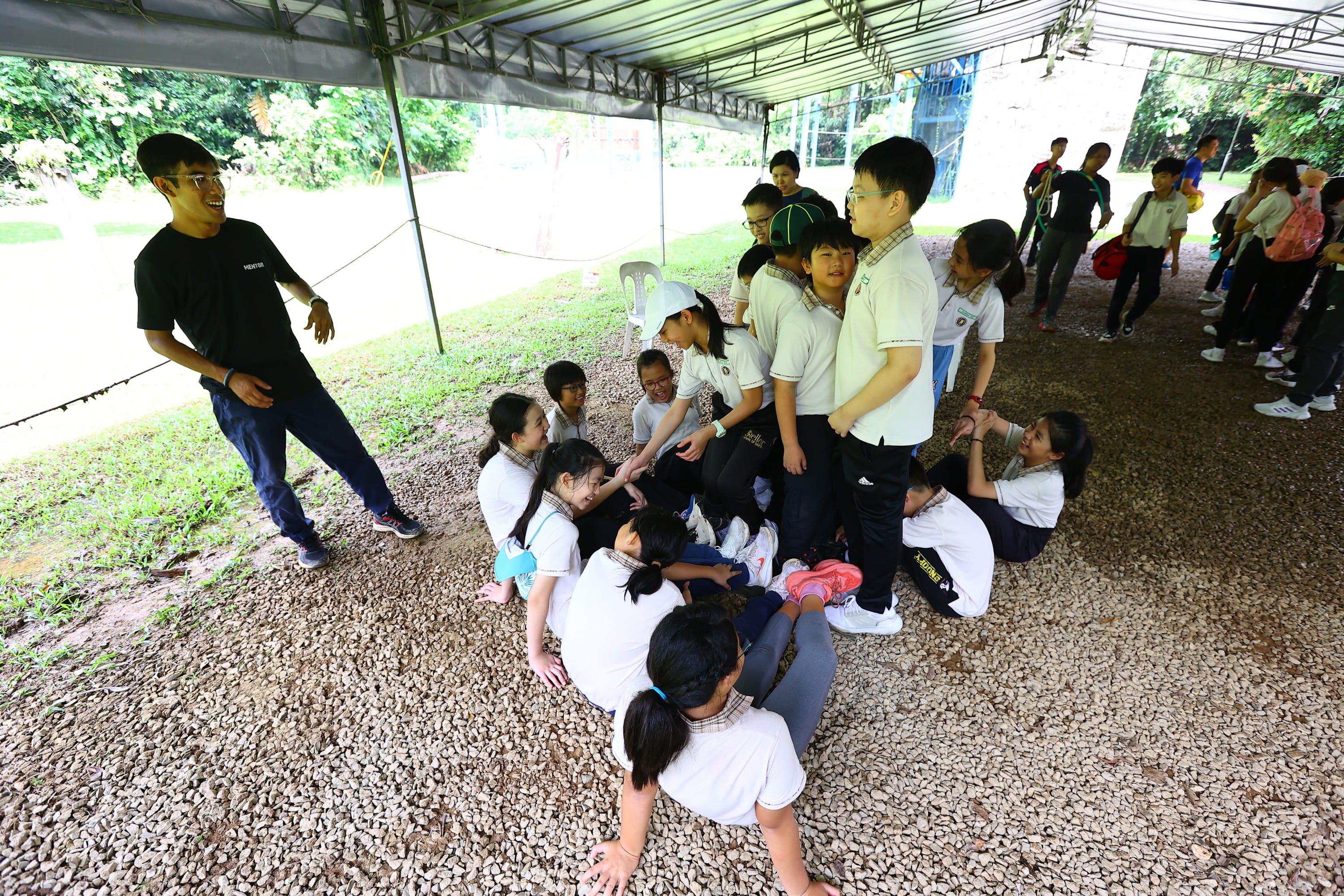 A few Primary 5 students involved in teambuilding activity
