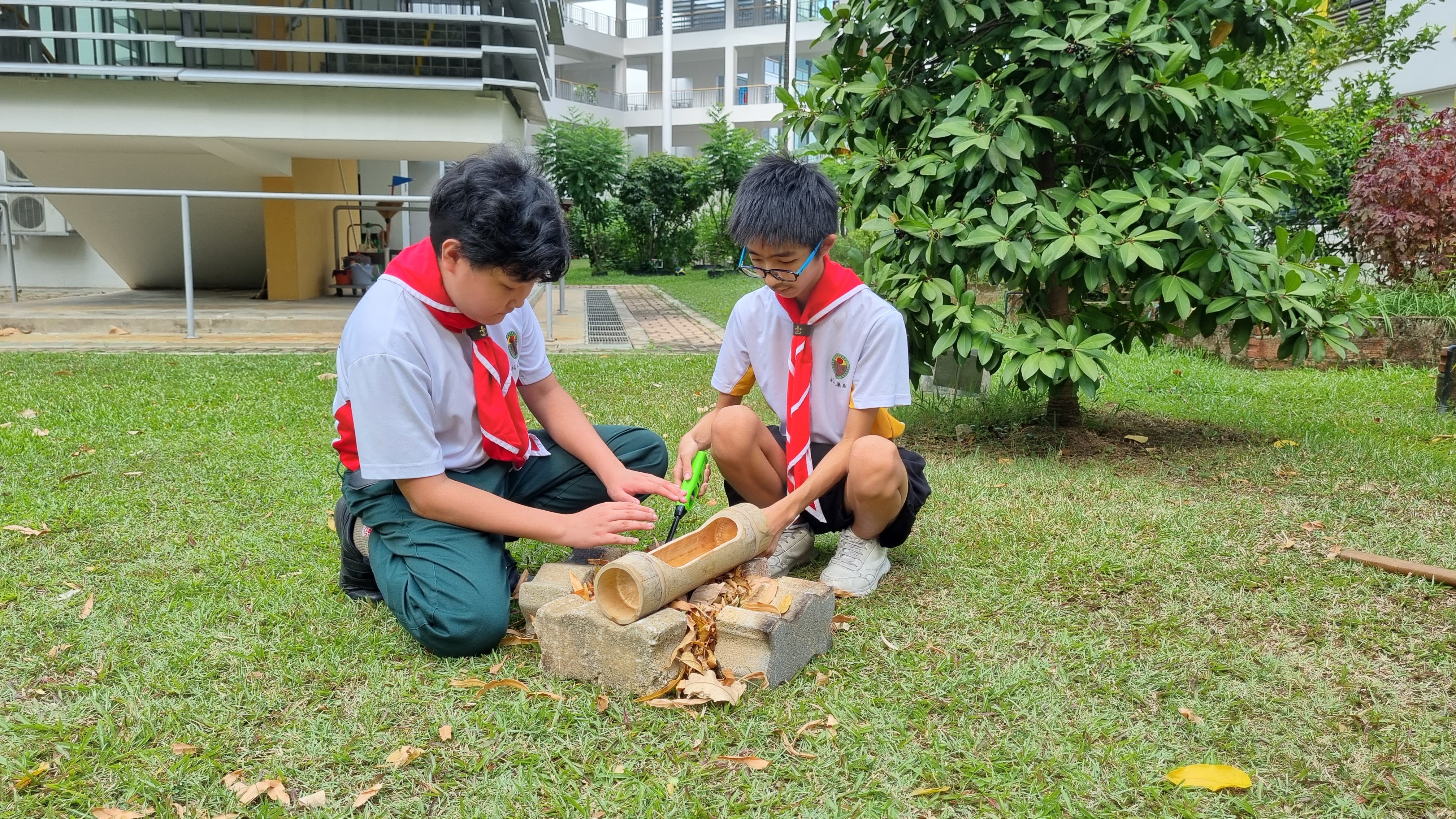 PSS Scouts lighting a simple stove during an outdoor cooking or campfire activity