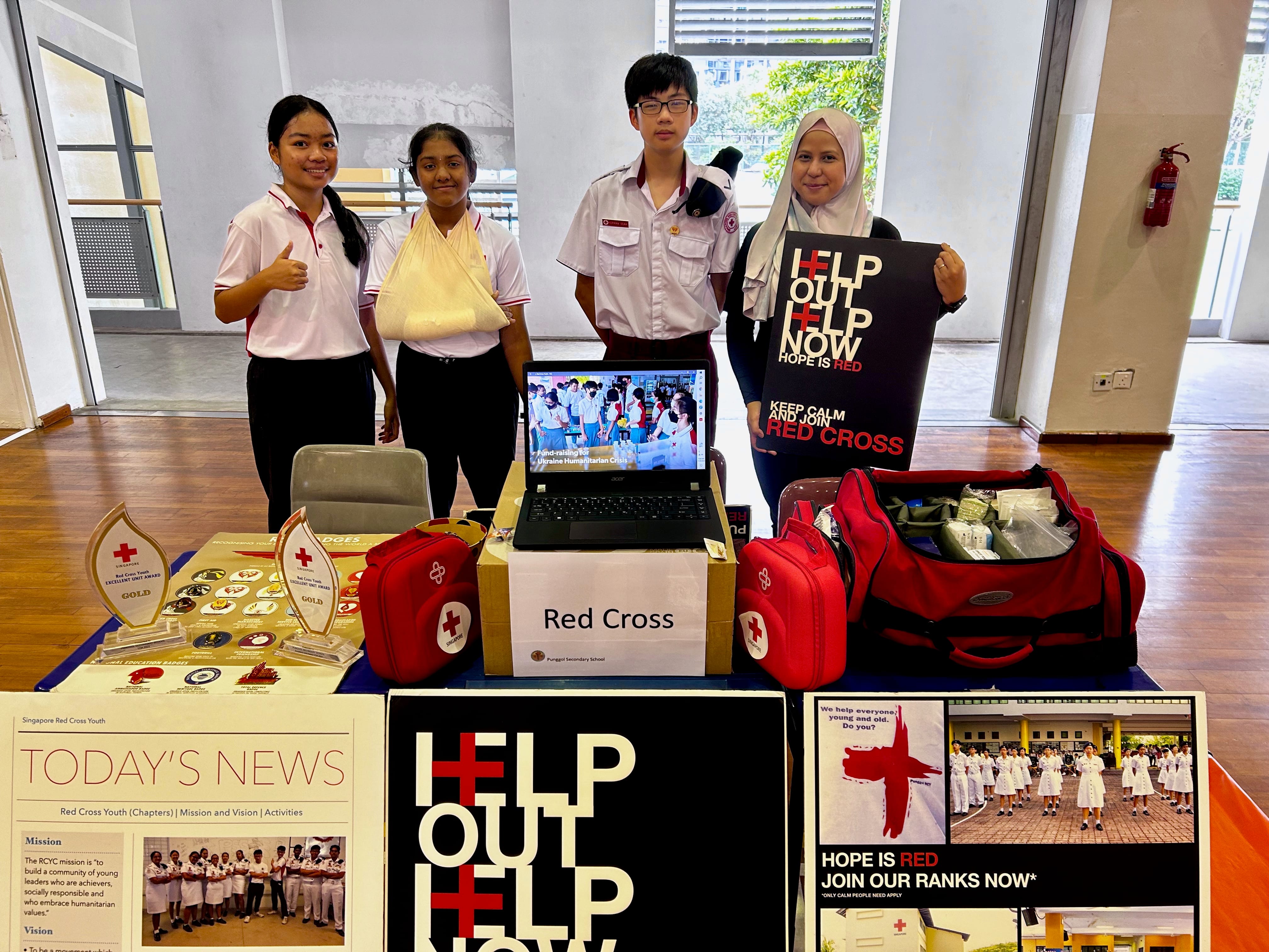 Red Cross cadets demonstrating camaraderie during a training activity or camp