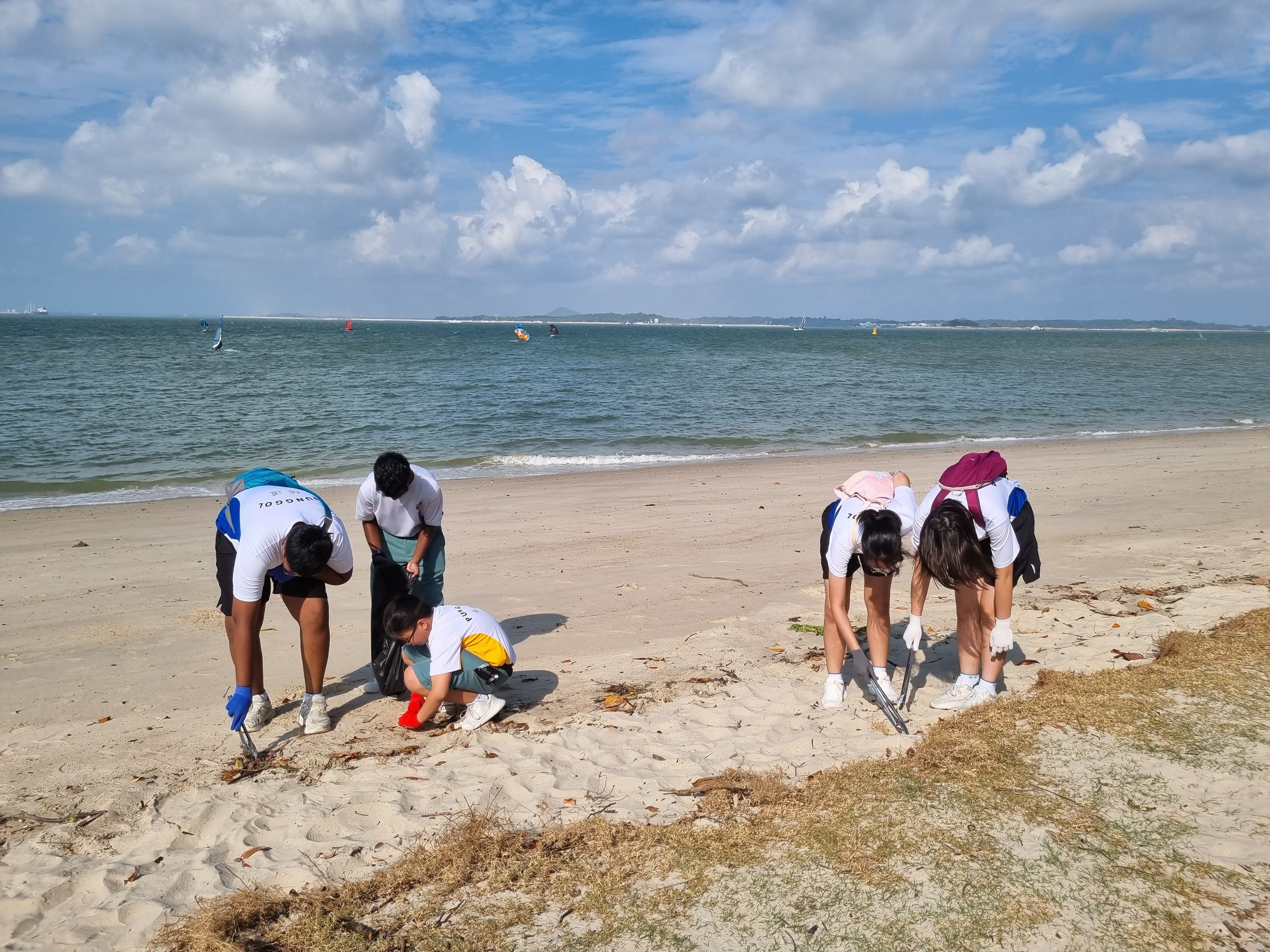 Environmental Club members conducting a beach clean-up at Changi Beach