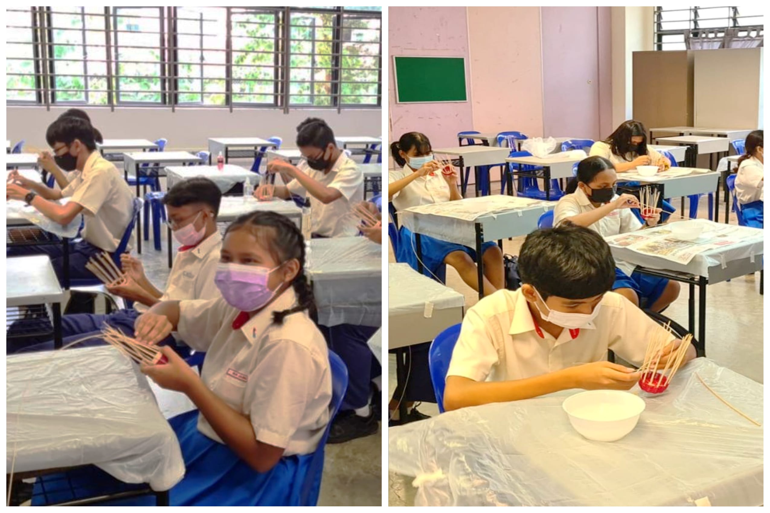 Students in school uniforms and face masks weave bamboo sticks at desks during a classroom craft activity.