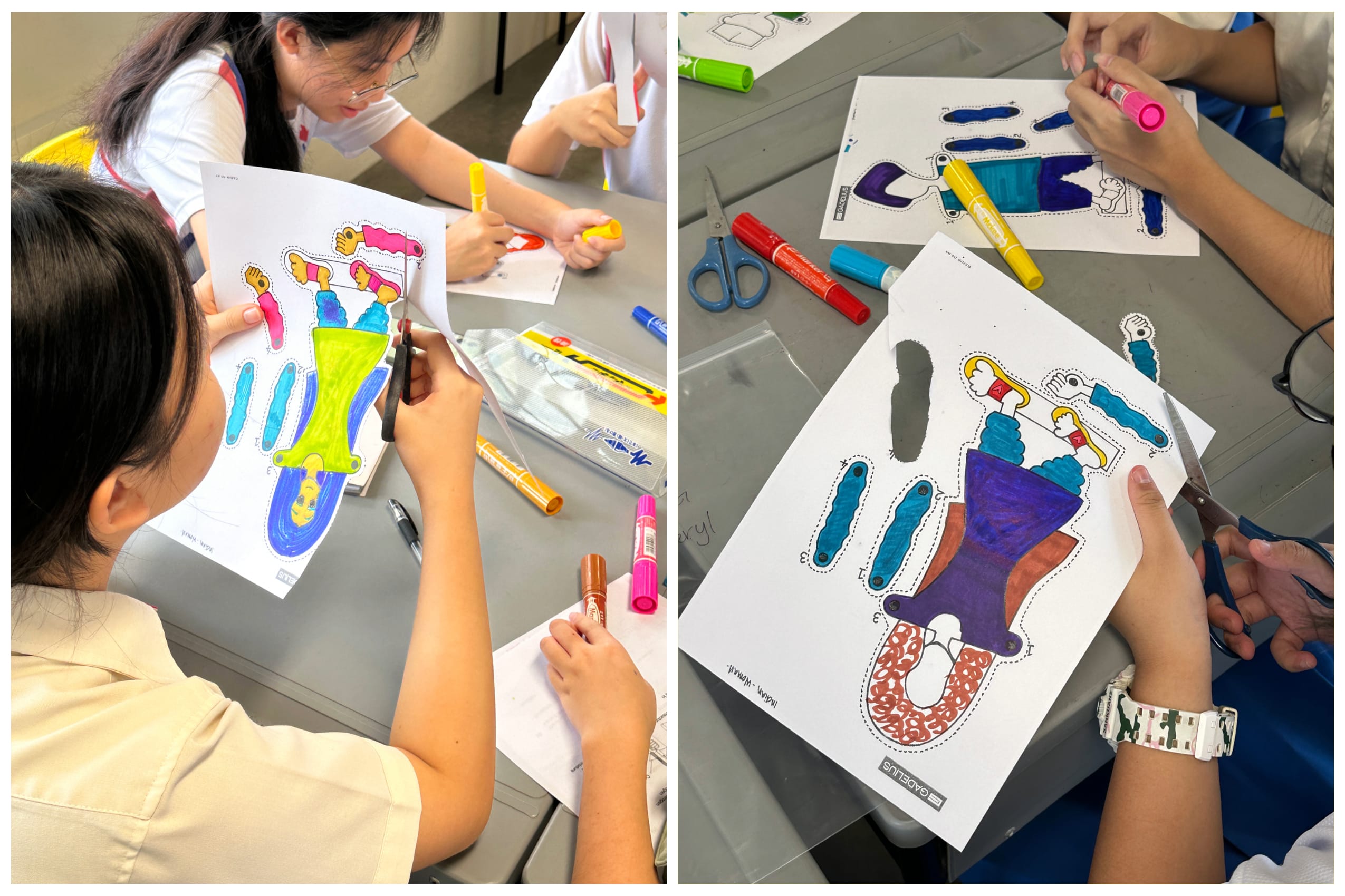 Students color and cut out printed body part diagrams using markers and scissors on gray tables.