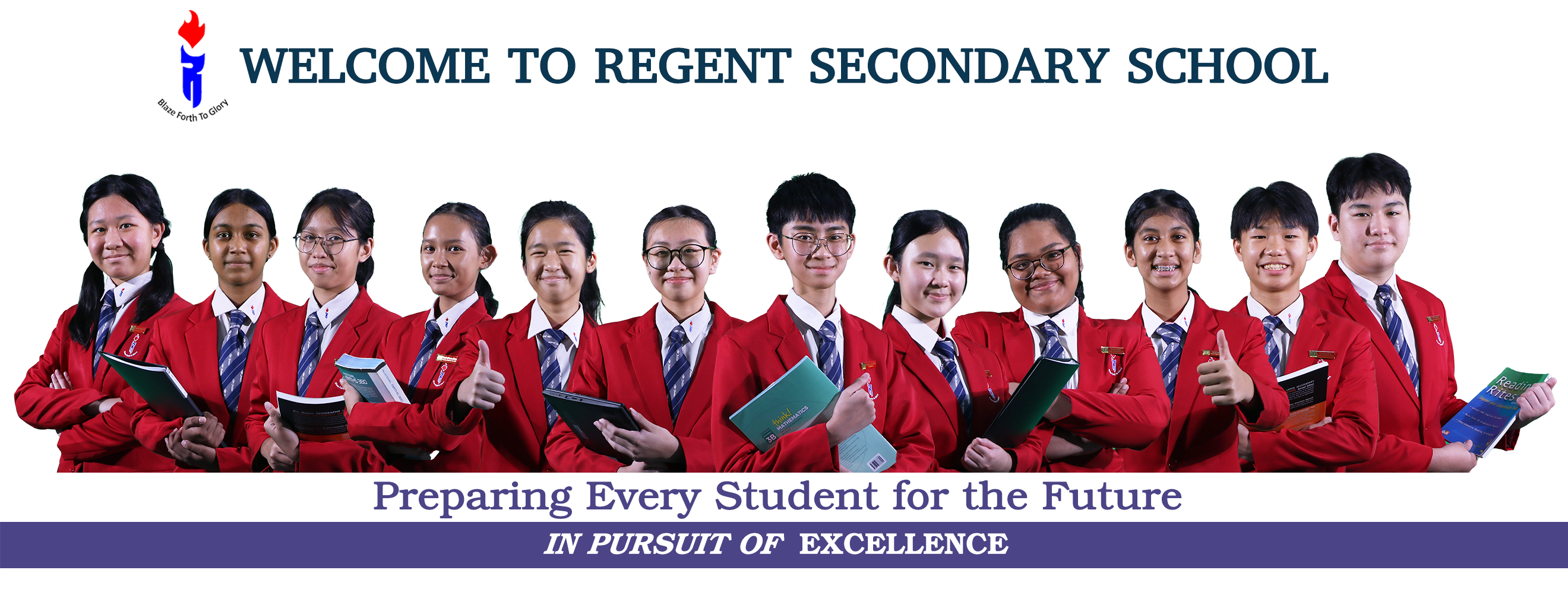 Eleven smiling students in red blazers holding books stand together under a Welcome to Regent Secondary School banner.