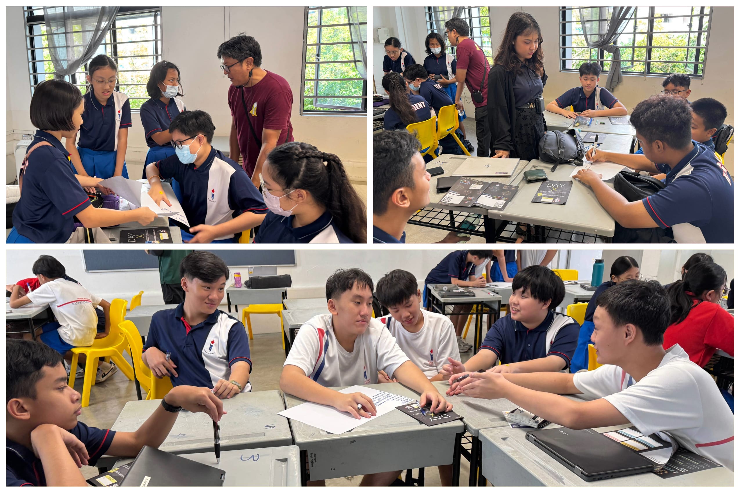 Students in navy uniforms collaborate in small groups at desks inside a bright classroom with yellow chairs.