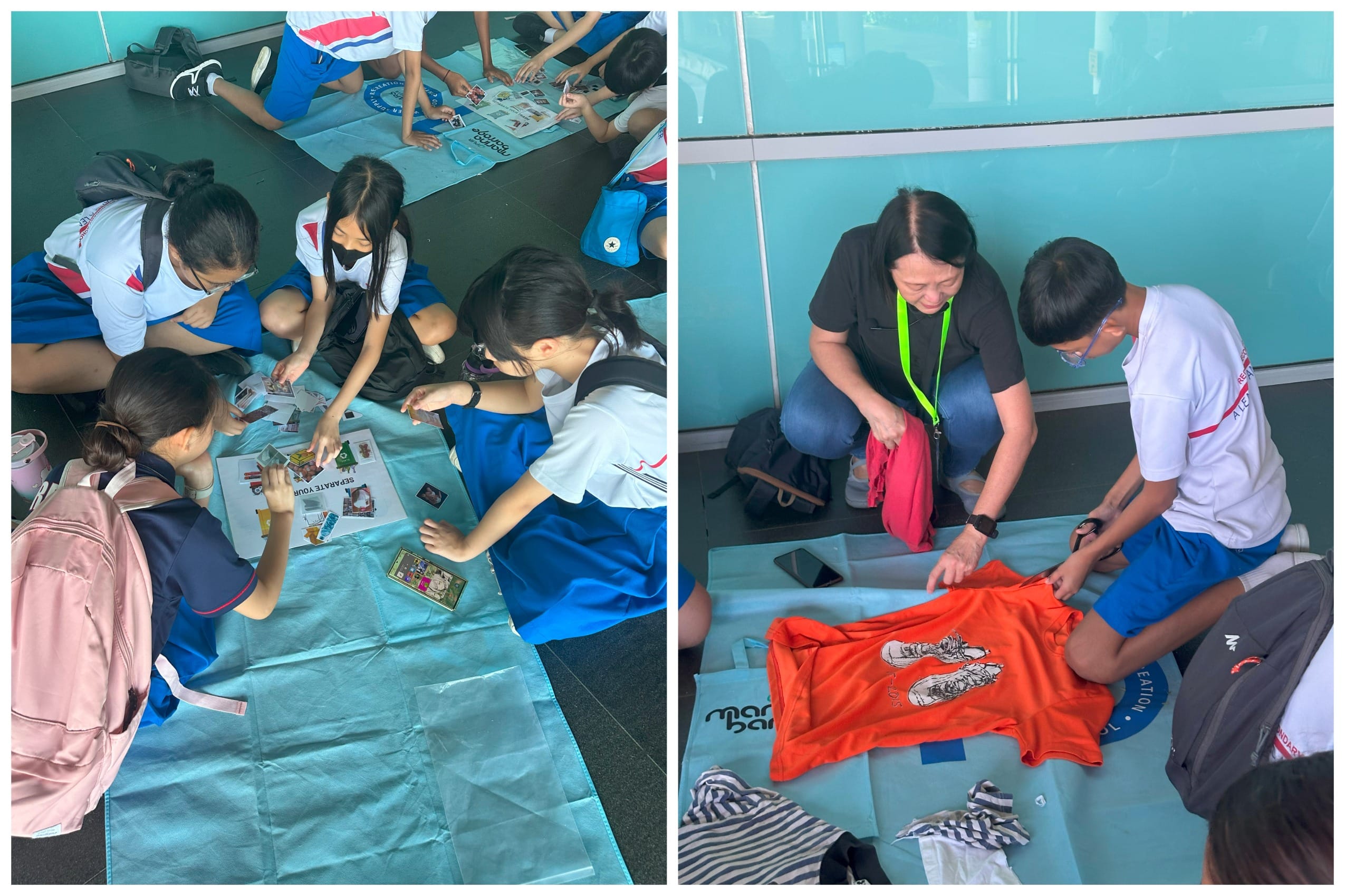 Students sit on blue mats sorting cards and clothing items, guided by an adult wearing a green lanyard.