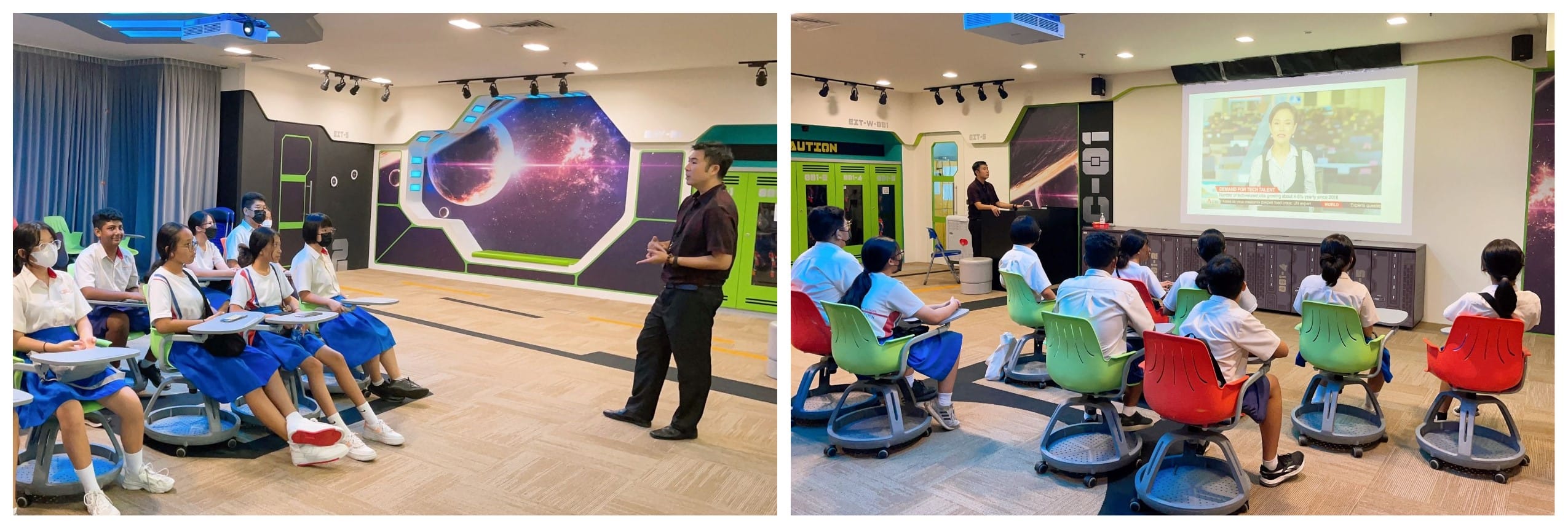 Students in uniforms sit on colorful chairs in a space-themed classroom while a teacher presents near a projected screen.