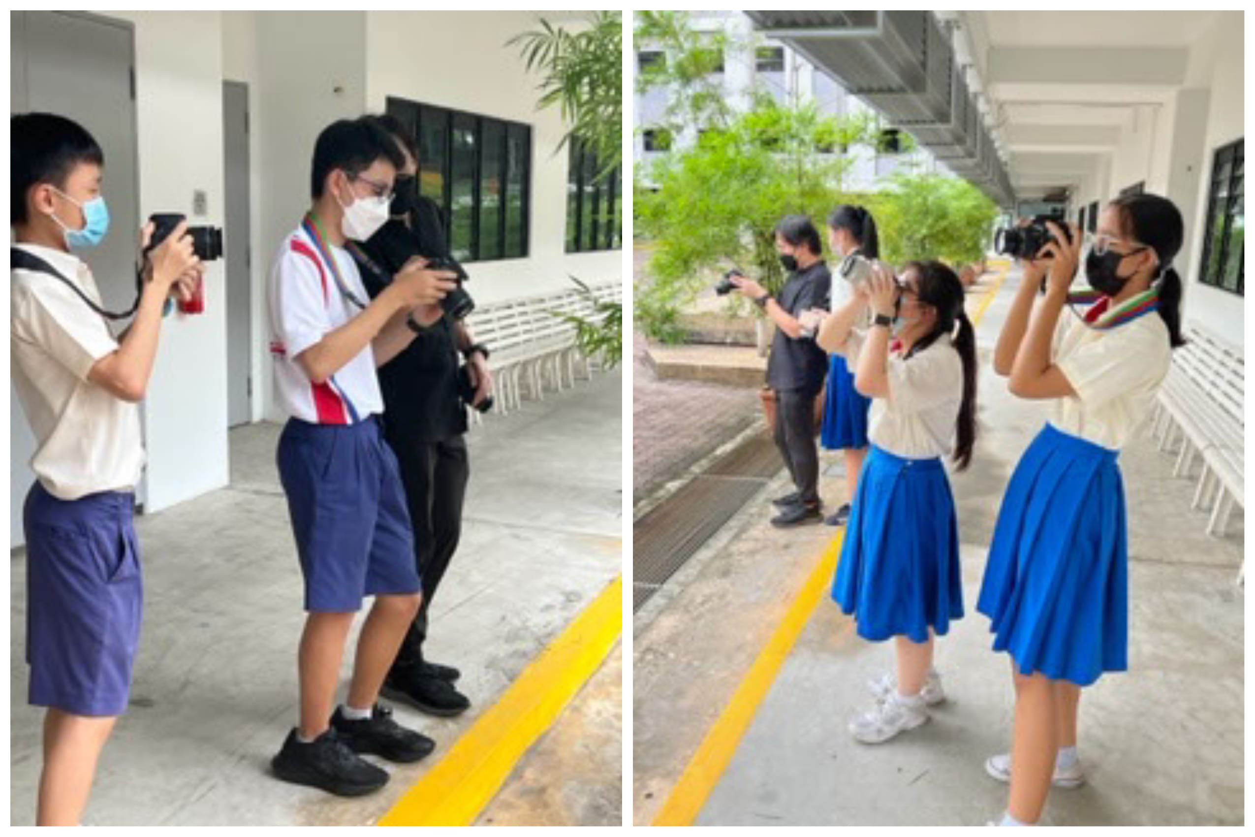 Students in school uniforms and face masks hold cameras outdoors at a school corridor during a photography activity.