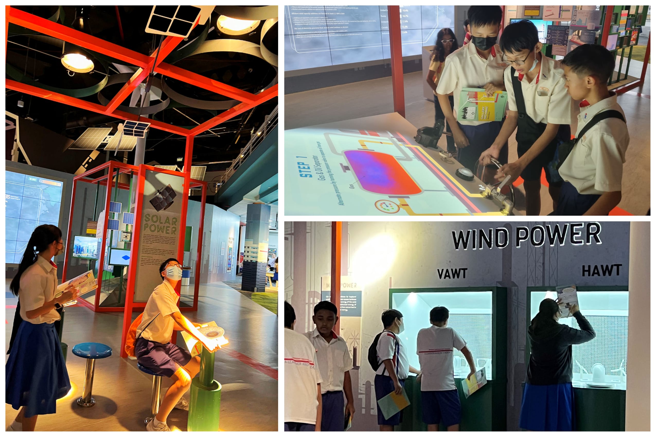 Students in school uniforms explore solar power and wind power exhibits at an interactive science museum.