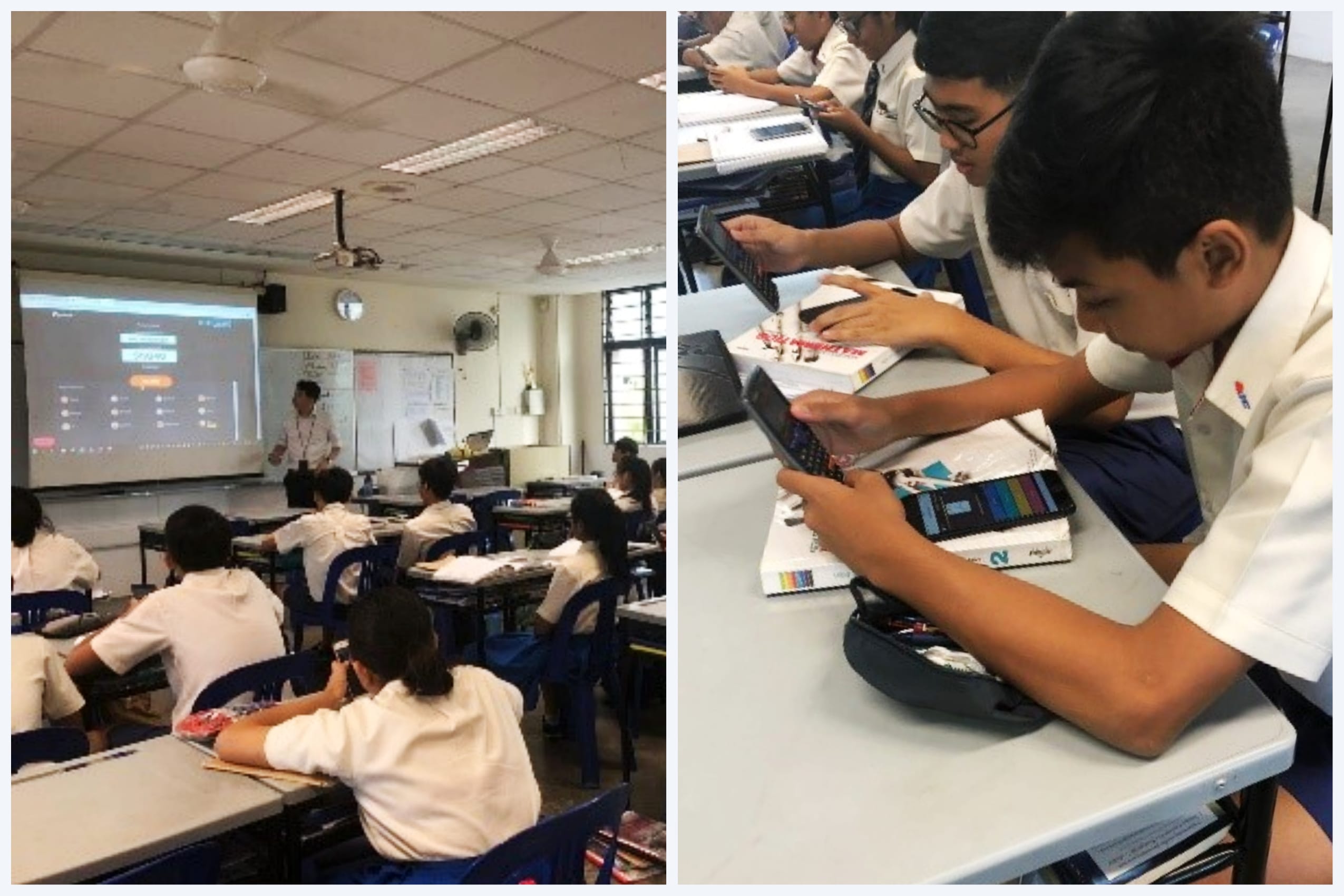 Students in white uniforms sit at desks using tablets while a teacher stands before a projected screen at the front.