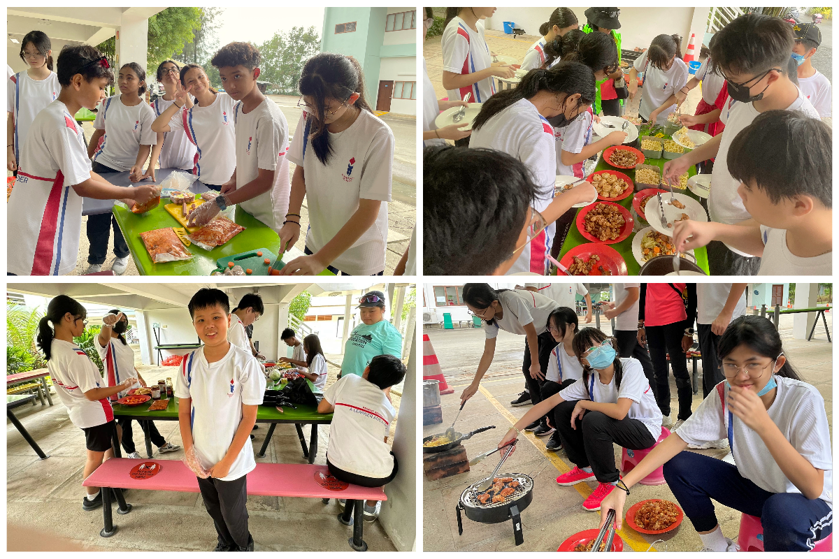 Students in white uniforms prepare, cook, and serve food outdoors during a school cooking activity.