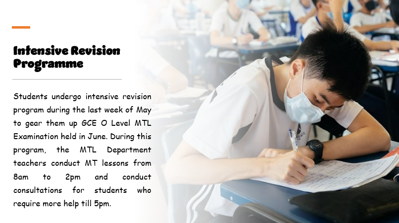 A masked student in a white uniform writes on paper at a desk during an intensive revision programme.