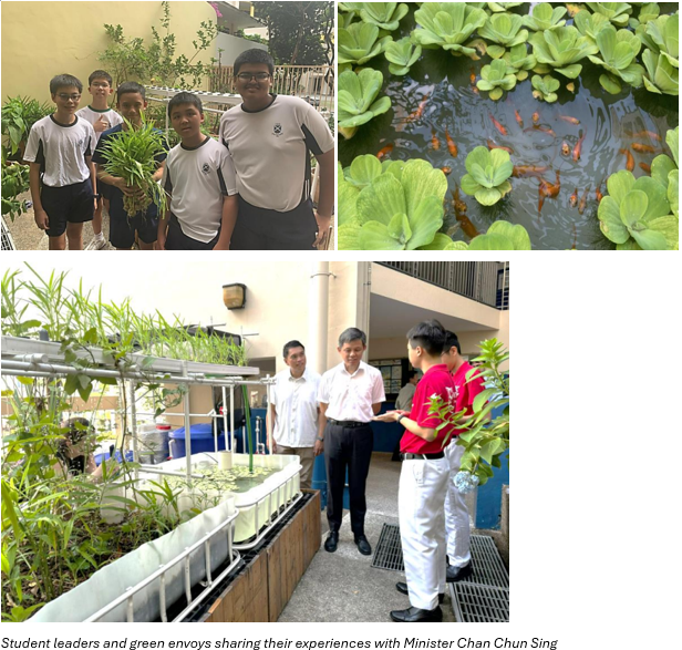Four students pose with plants, a pond with fish and lily pads, and adults viewing an aquaponics setup outdoors.