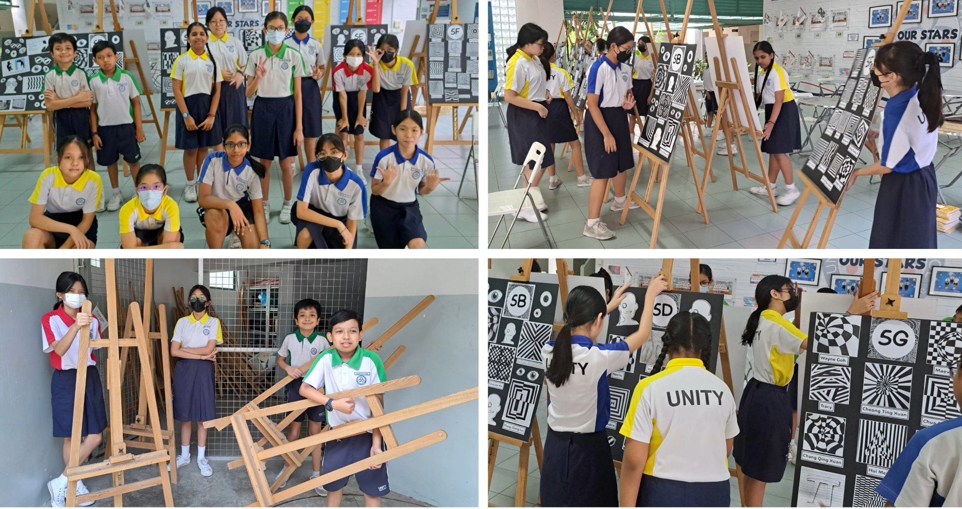 Students in school uniforms display black and white artwork on wooden easels at an indoor art exhibition.