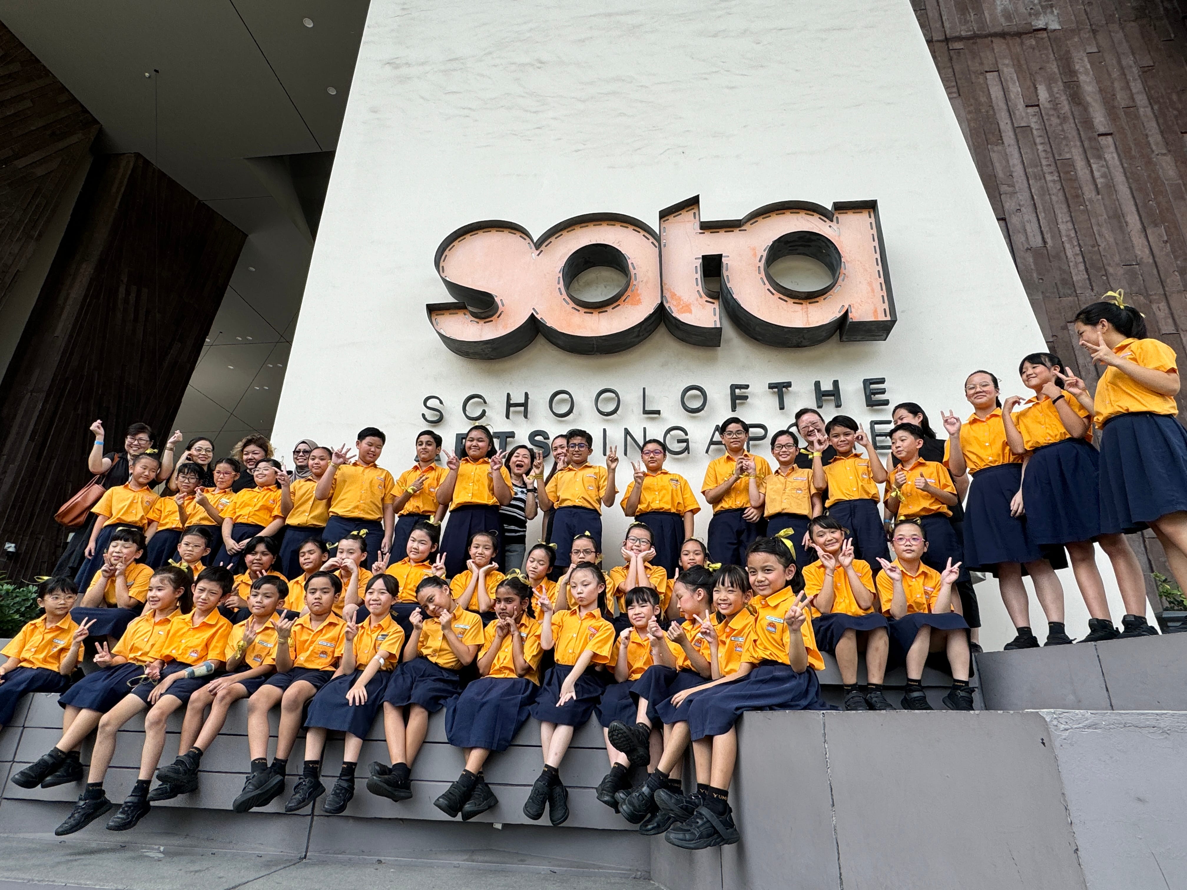 Our students posing in front of the School of the Arts Singapore.