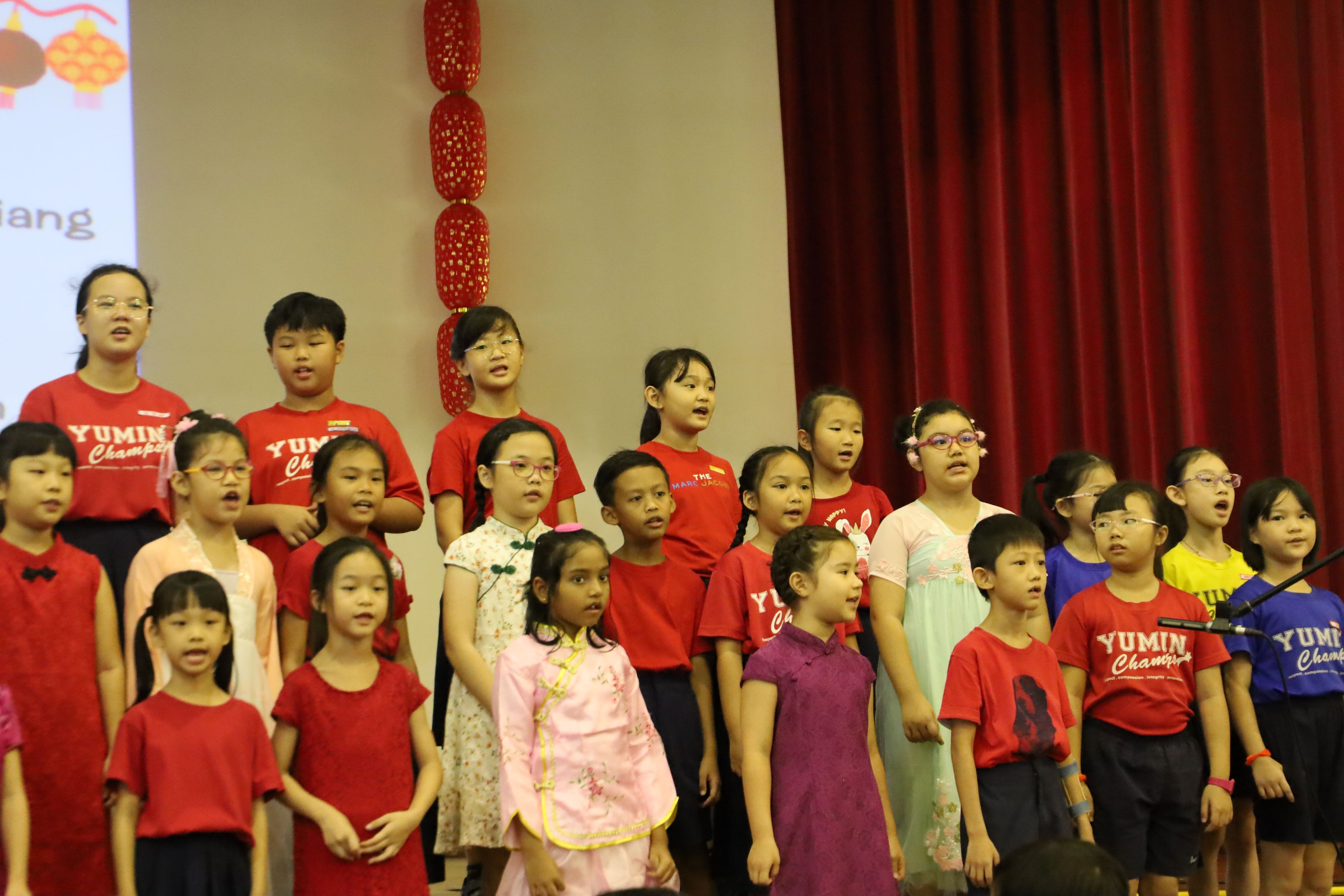 Our students performing on stage during CNY celebration..