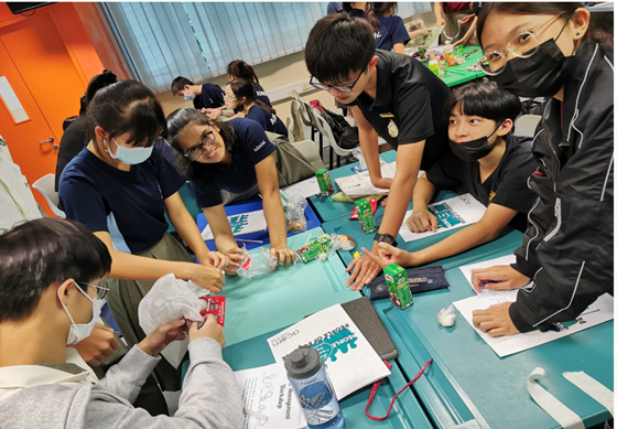 Students working together on projector management and design thinking workshops for VIA leaders.