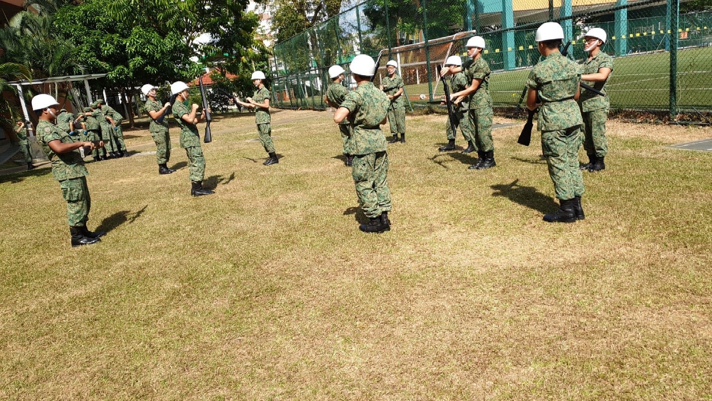 Students in their uniform during their final warmup before the commencement of the Annual PDS competition performance