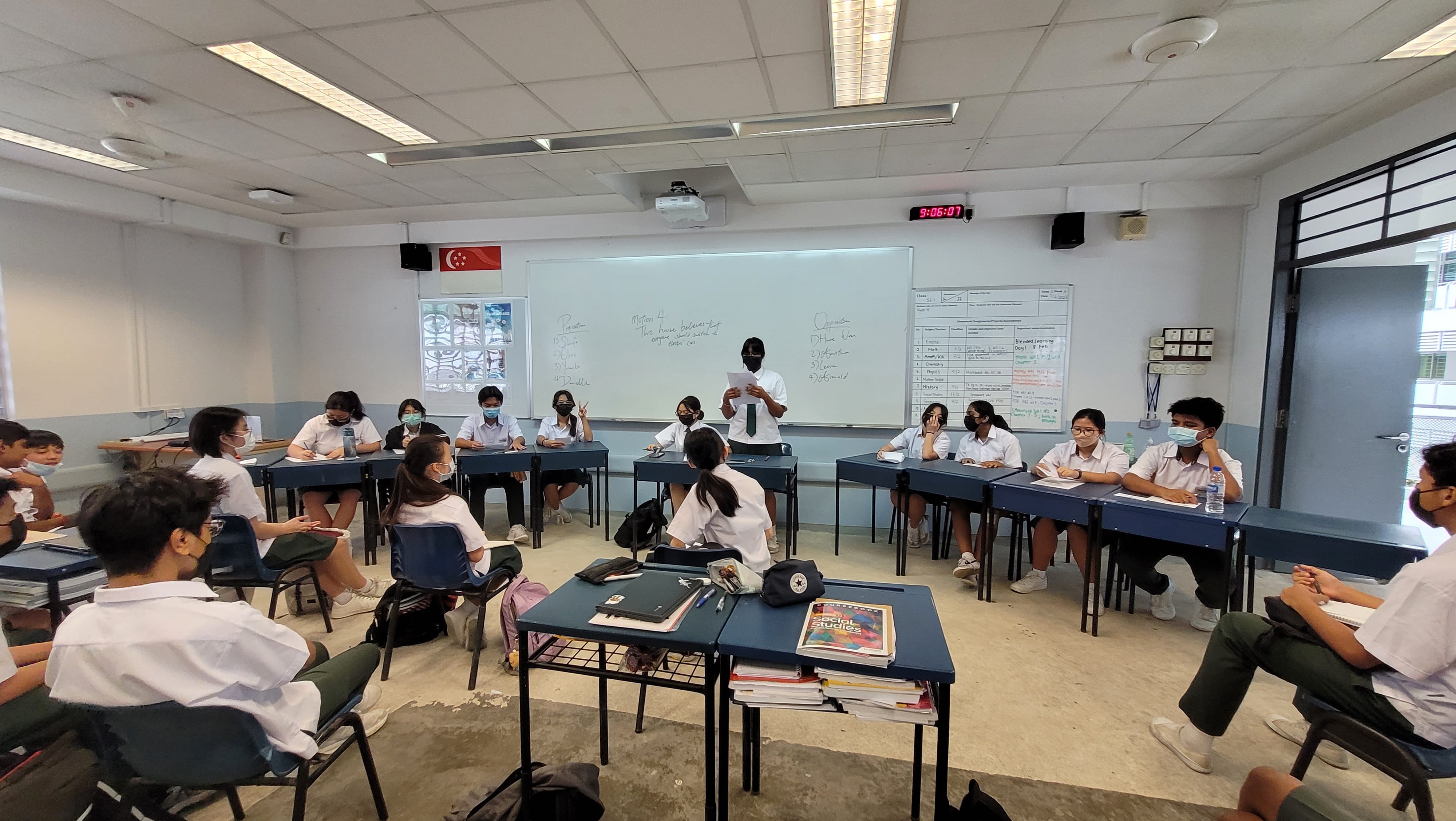 Secondary 3 students taking part in the intra-class debate