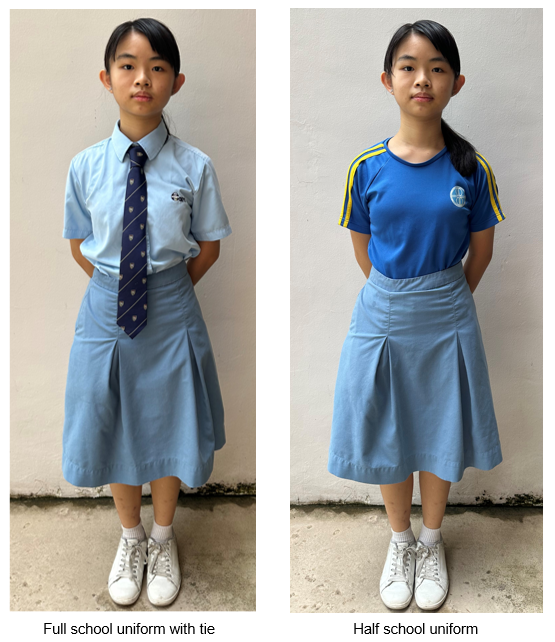 Two girls wearing school uniforms: one in a light blue shirt with tie, the other in a blue sports top, both with blue skirts.