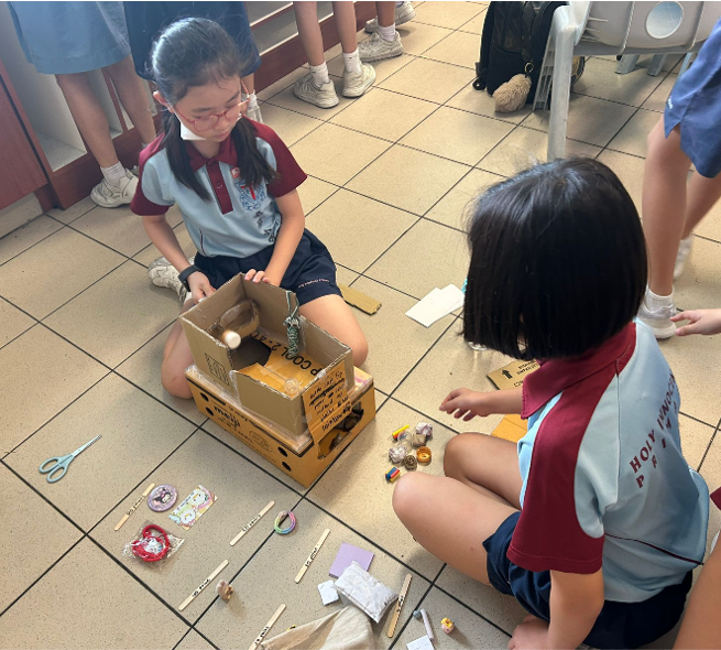 Students apply their science knowledge in designing and creating their own toys, turning ideas into innovative creations.