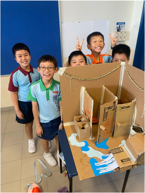 Students designing a prototype to improve spaces in the school.