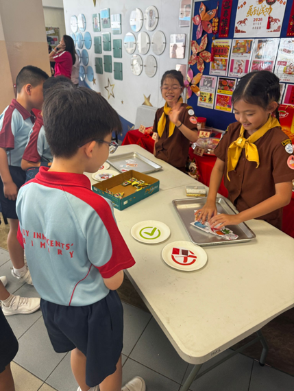 Serving with honor and learning to be prepared! 🇸🇬 Honor to our Flag Bearers at the National Day Celebration, and hands-on readiness during Total Defence Day with Emergency Kit prep!