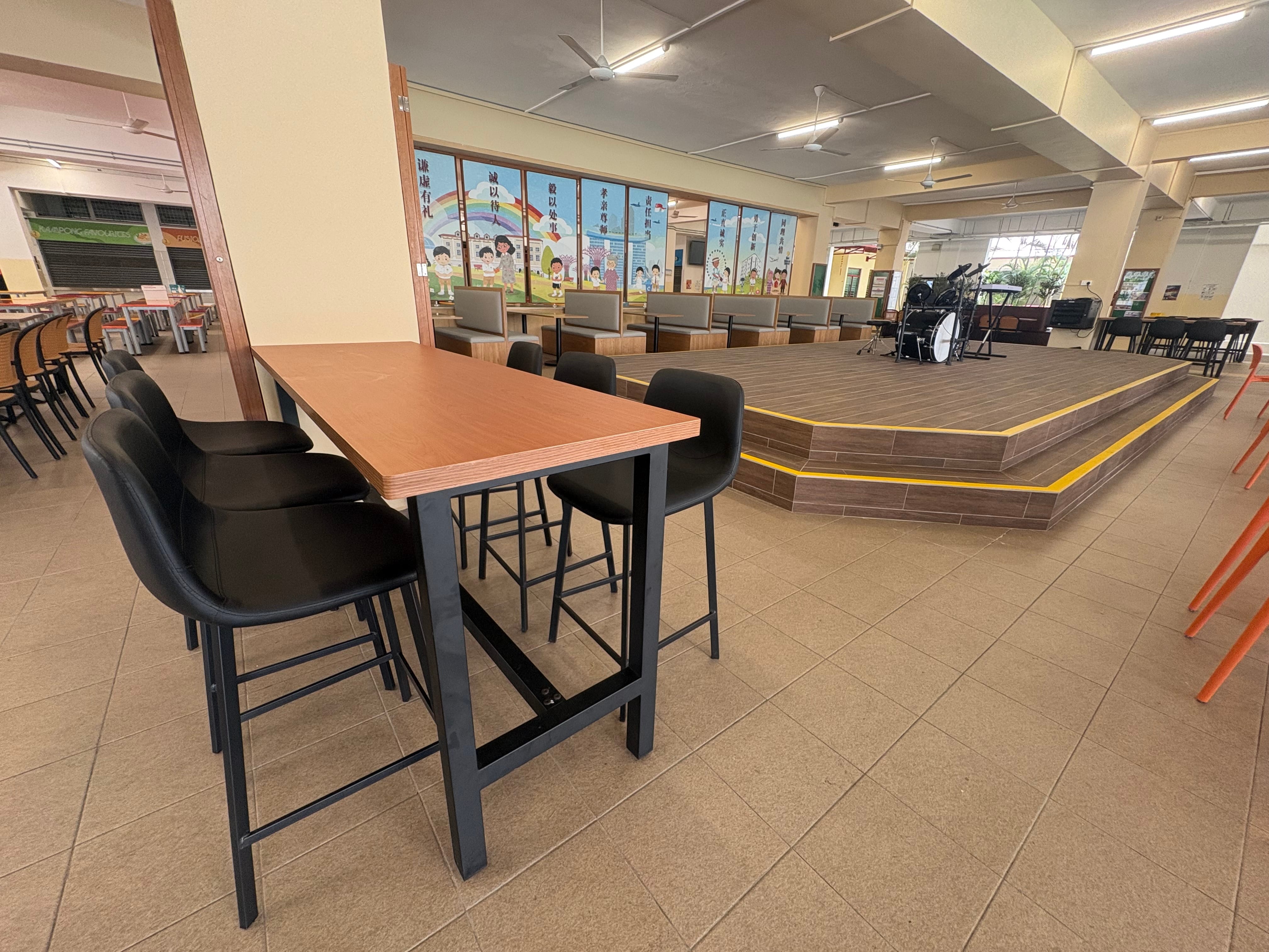 school canteen cafeteria style seating arrangement with high tables and chairs