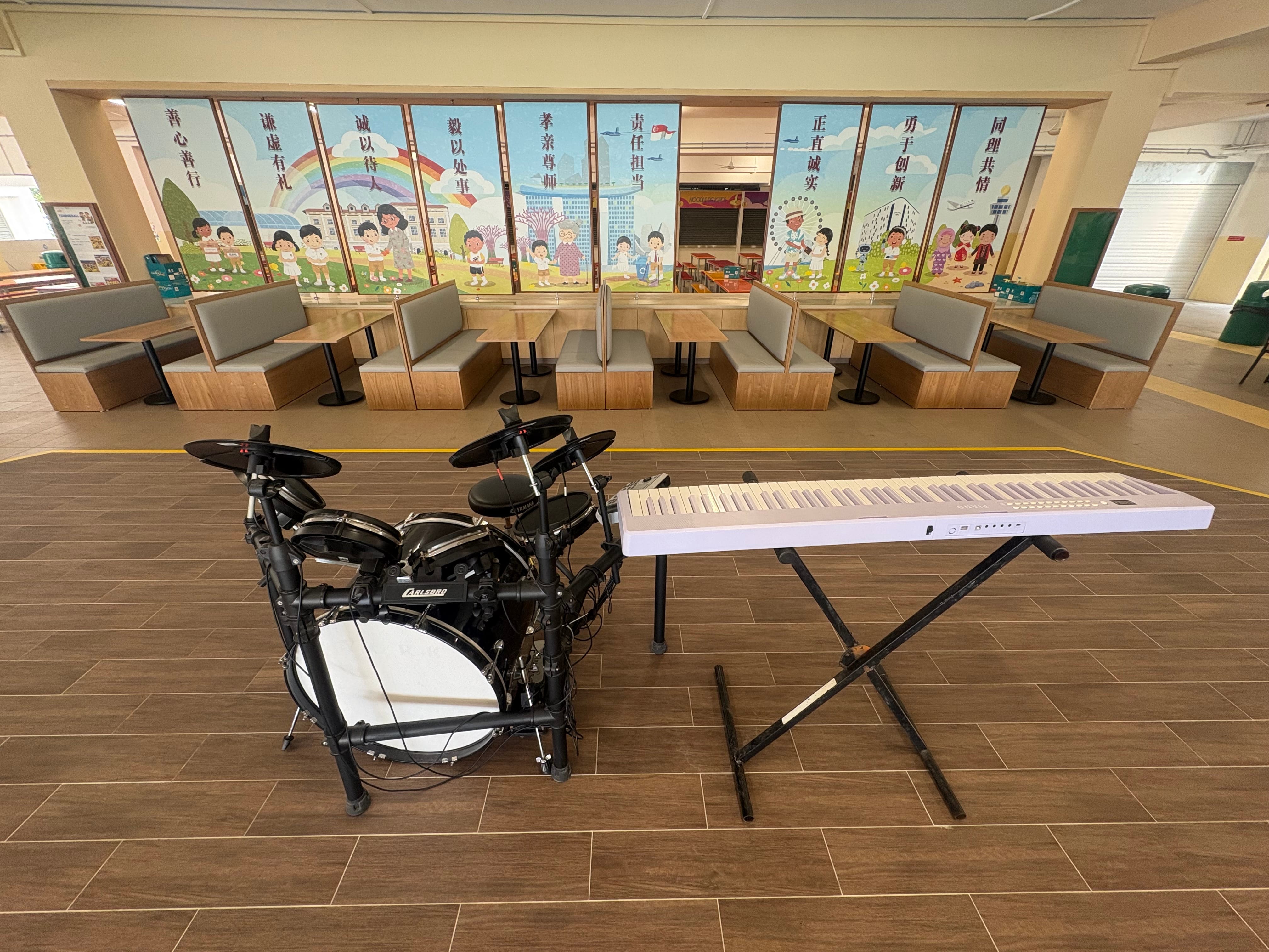 school canteen perfomance platform with digital piano set and drum set