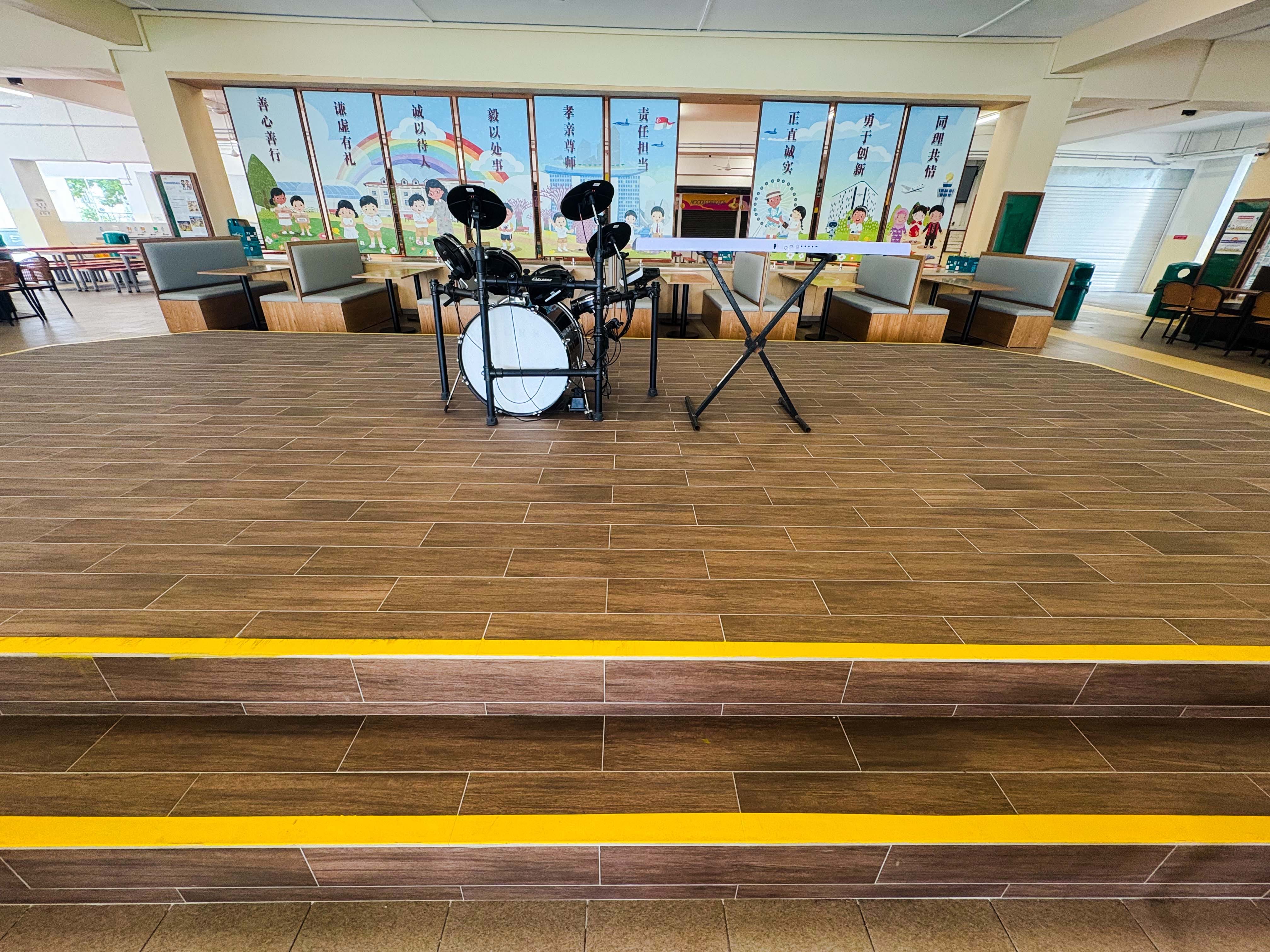 school canteen perfomance platform with digital piano set and drum set