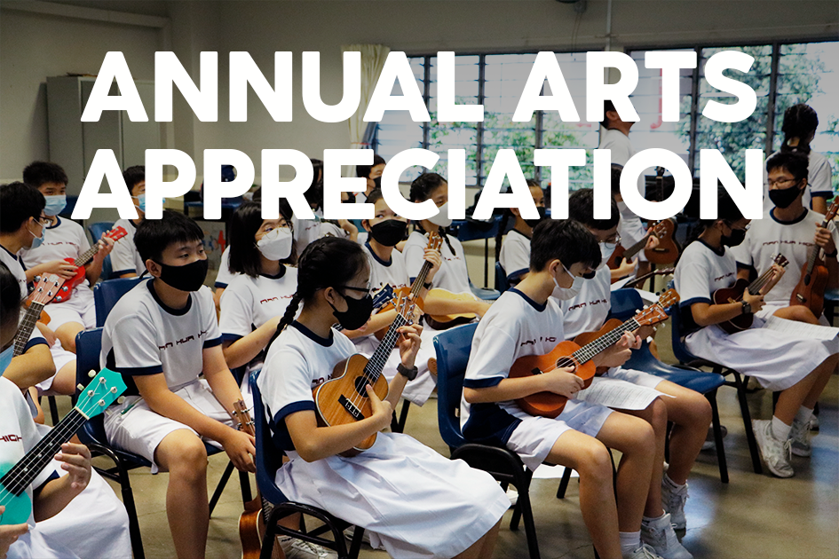 Students in white uniforms and black masks sit in a classroom playing ukuleles during Annual Arts Appreciation.