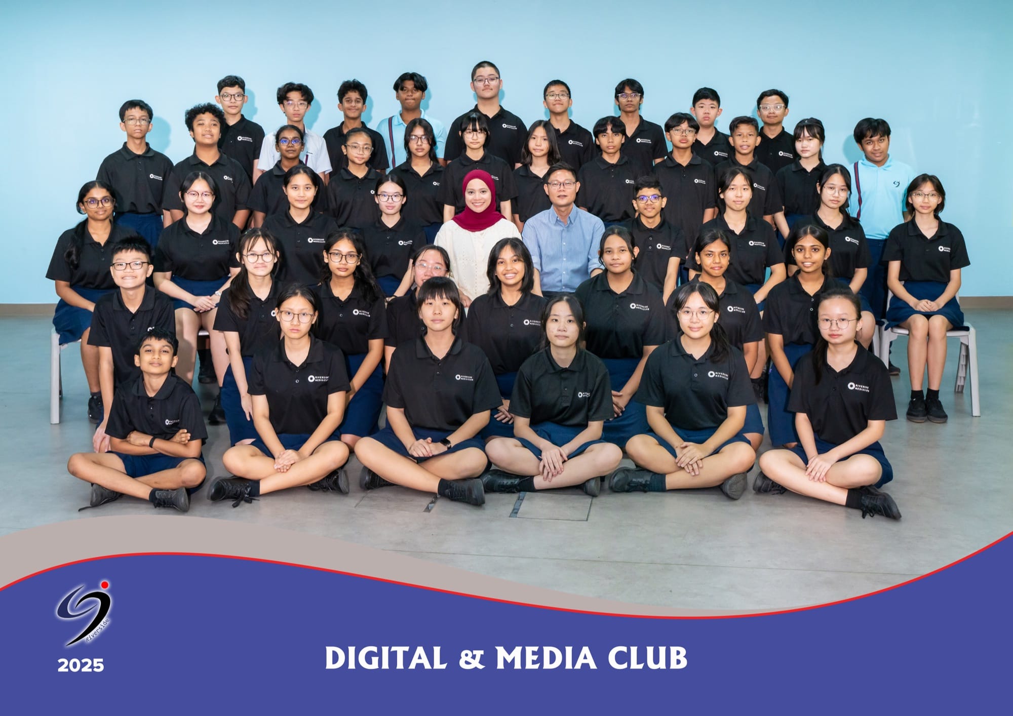 Digital and Media Club members in black club polo shirts with their two teachers-in-charge, in a 2025 group photo.