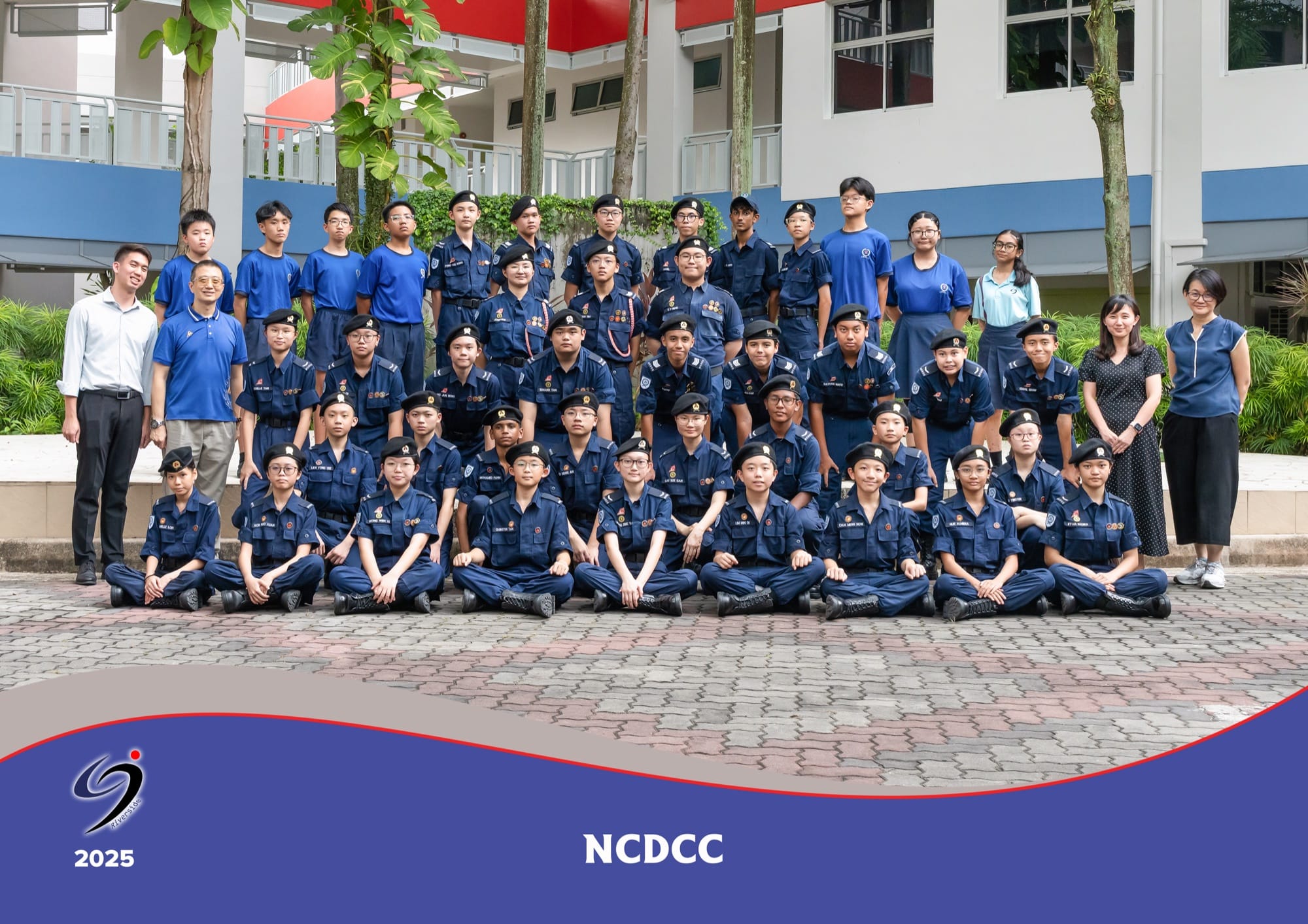 The NCDCC unit in uniform with their teachers-in-charge, in a 2025 group photo.