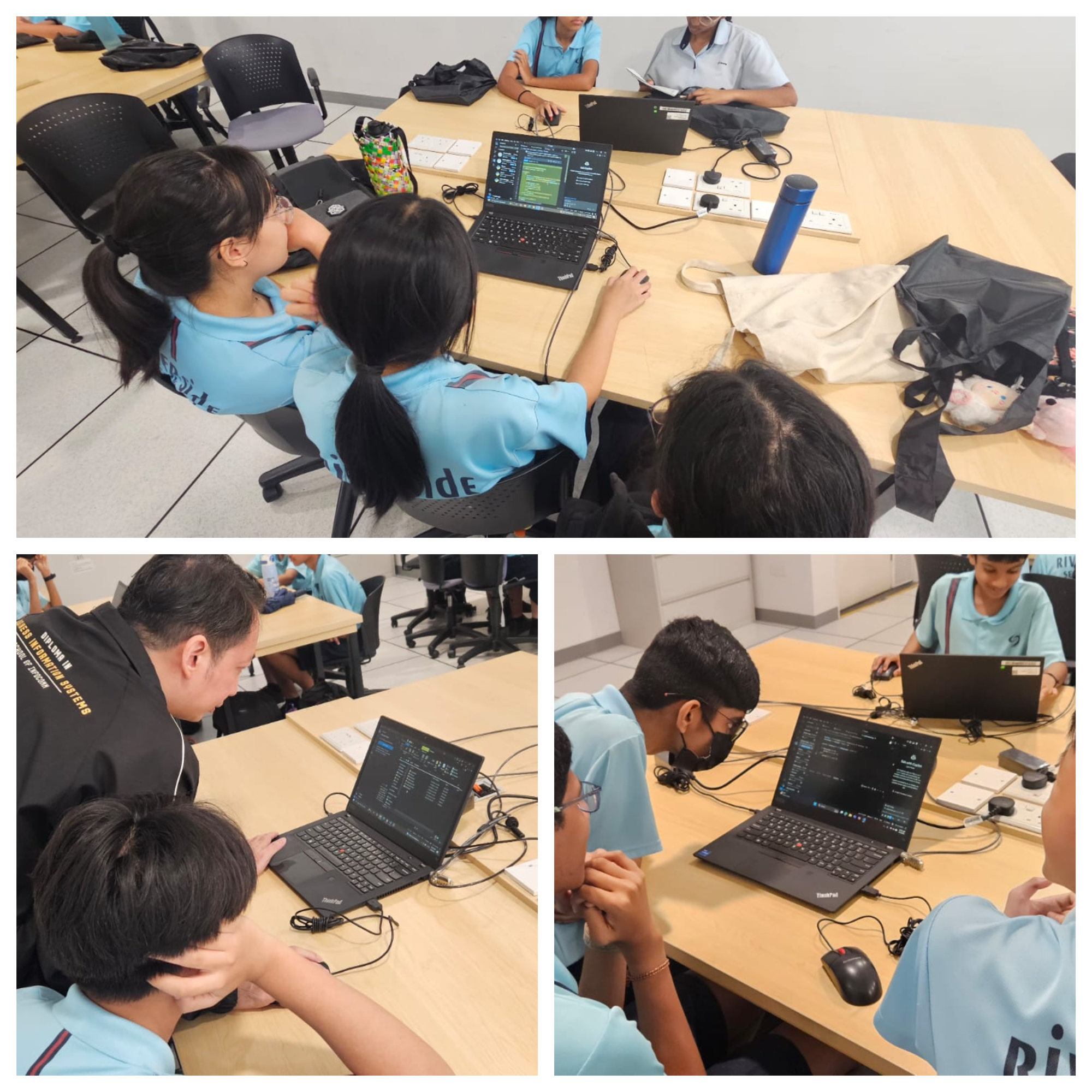 Students in blue uniforms gather around ThinkPad laptops showing code, working together at wooden tables in a classroom.