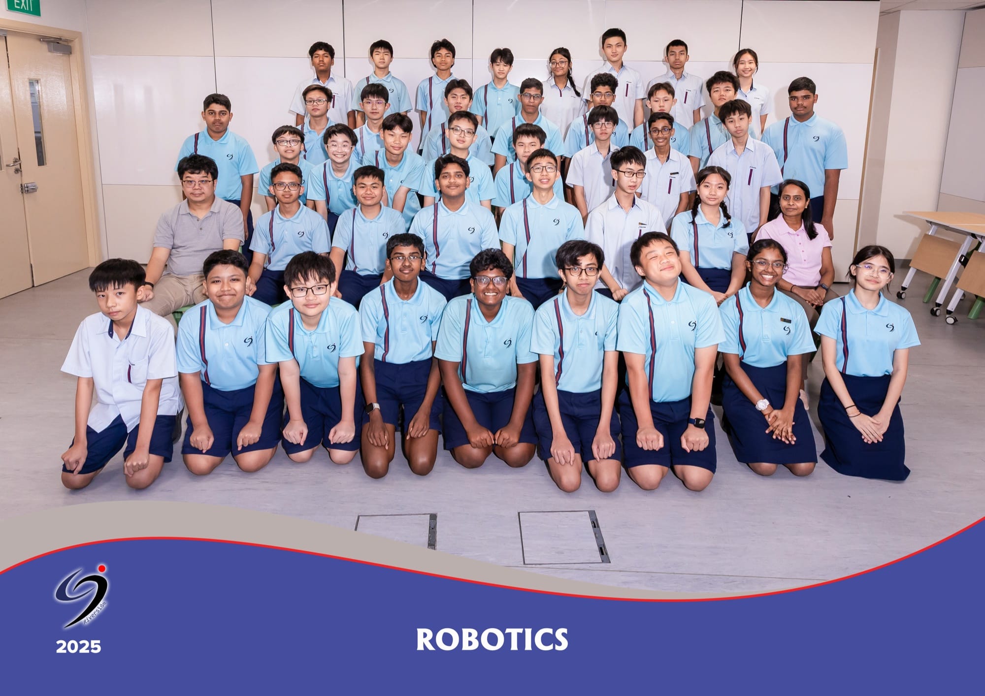 Robotics Club members in school uniform with their two teachers-in-charge, in a 2025 group photo.