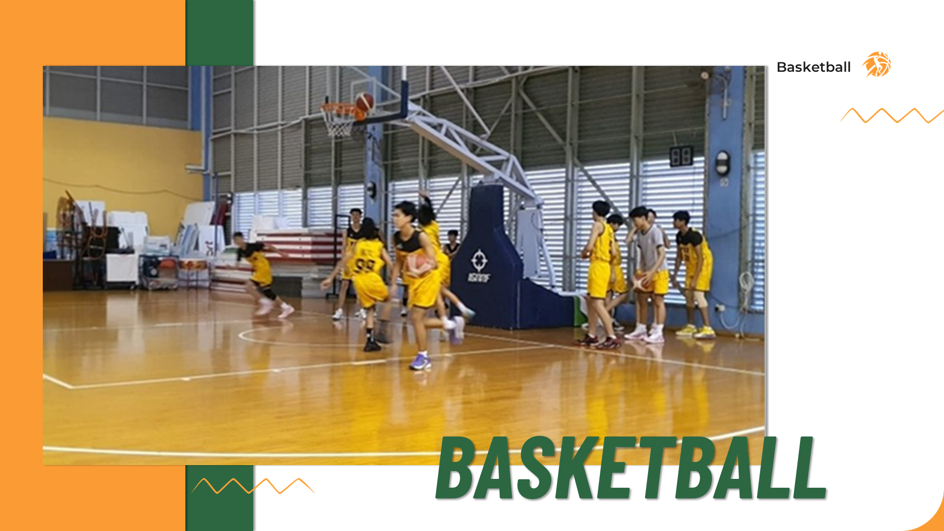 Basketball players conducting drills and practicing movement on an indoor court.