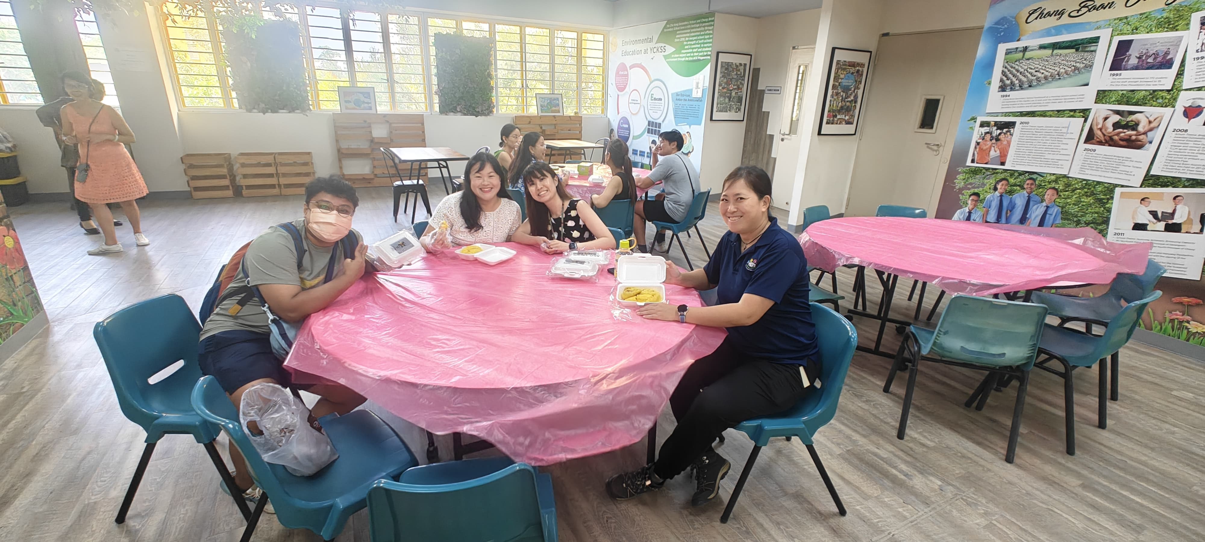 4 ladies smiling for the camera with their durians.