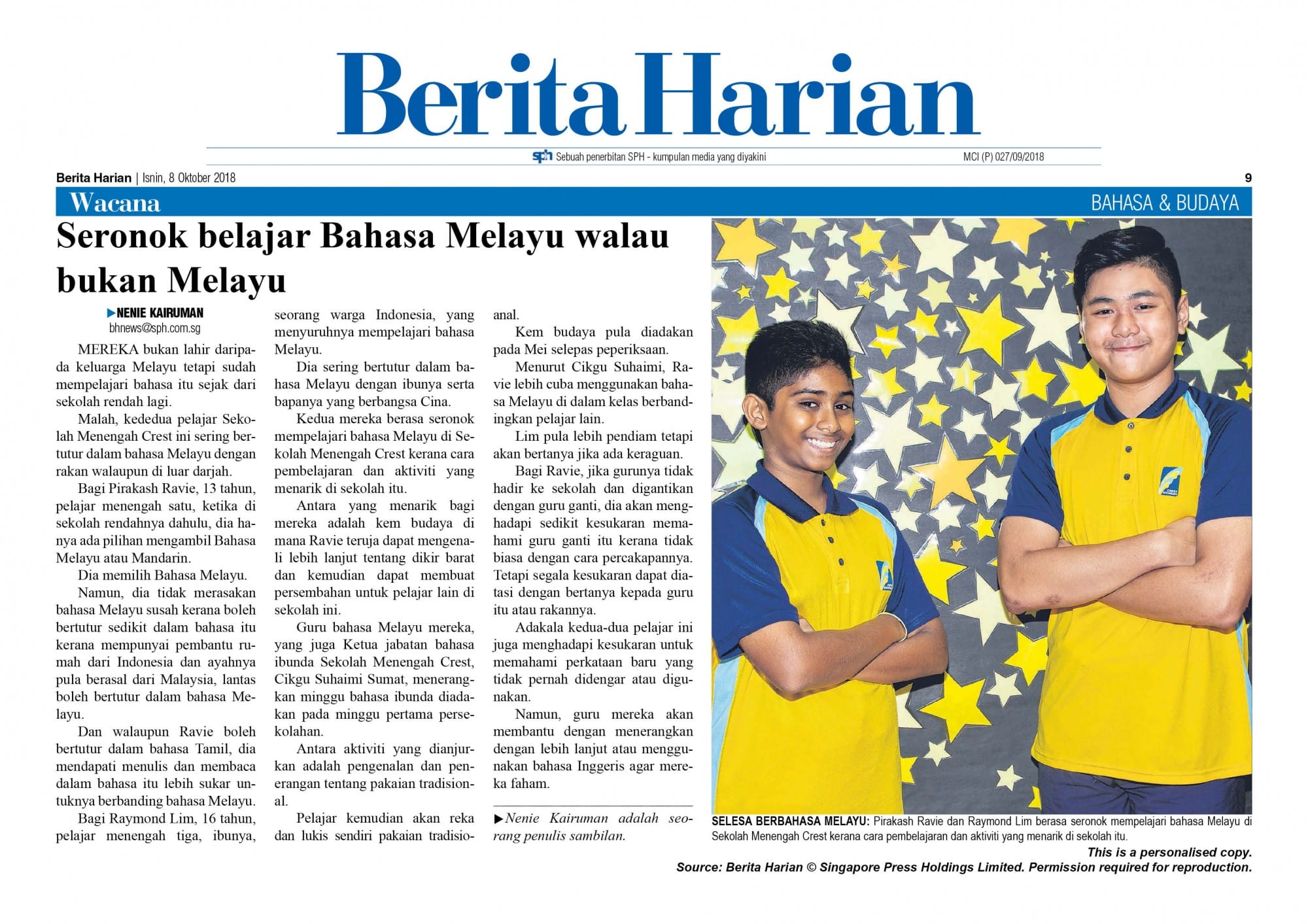 Berita Harian newspaper page featuring two smiling teenage boys in blue and yellow school uniforms posing together.