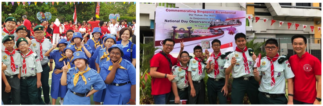 Students in scout uniforms pose at Singapore's National Day Observance Ceremony 2019, with a commemorative bicentennial banner.
