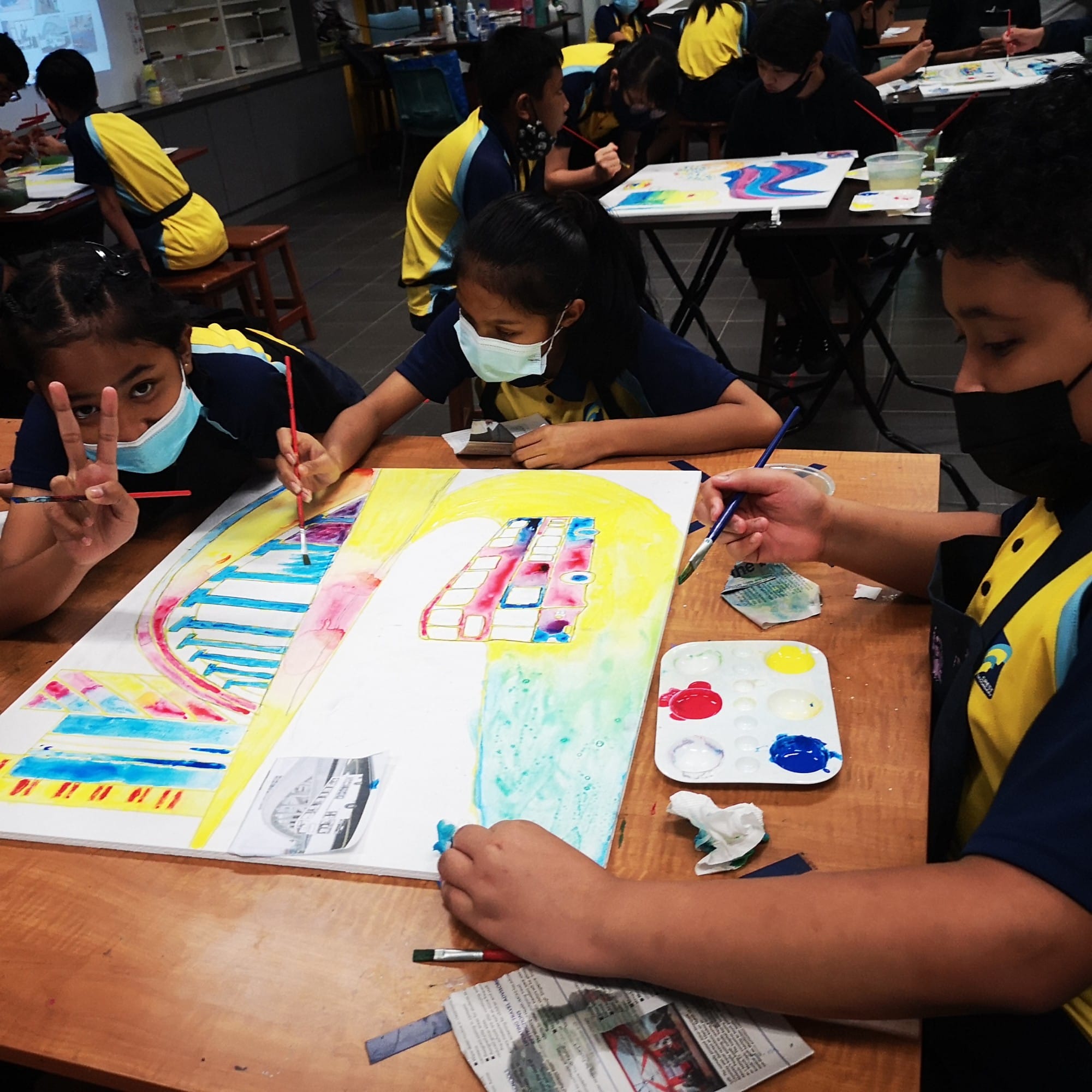 students painting