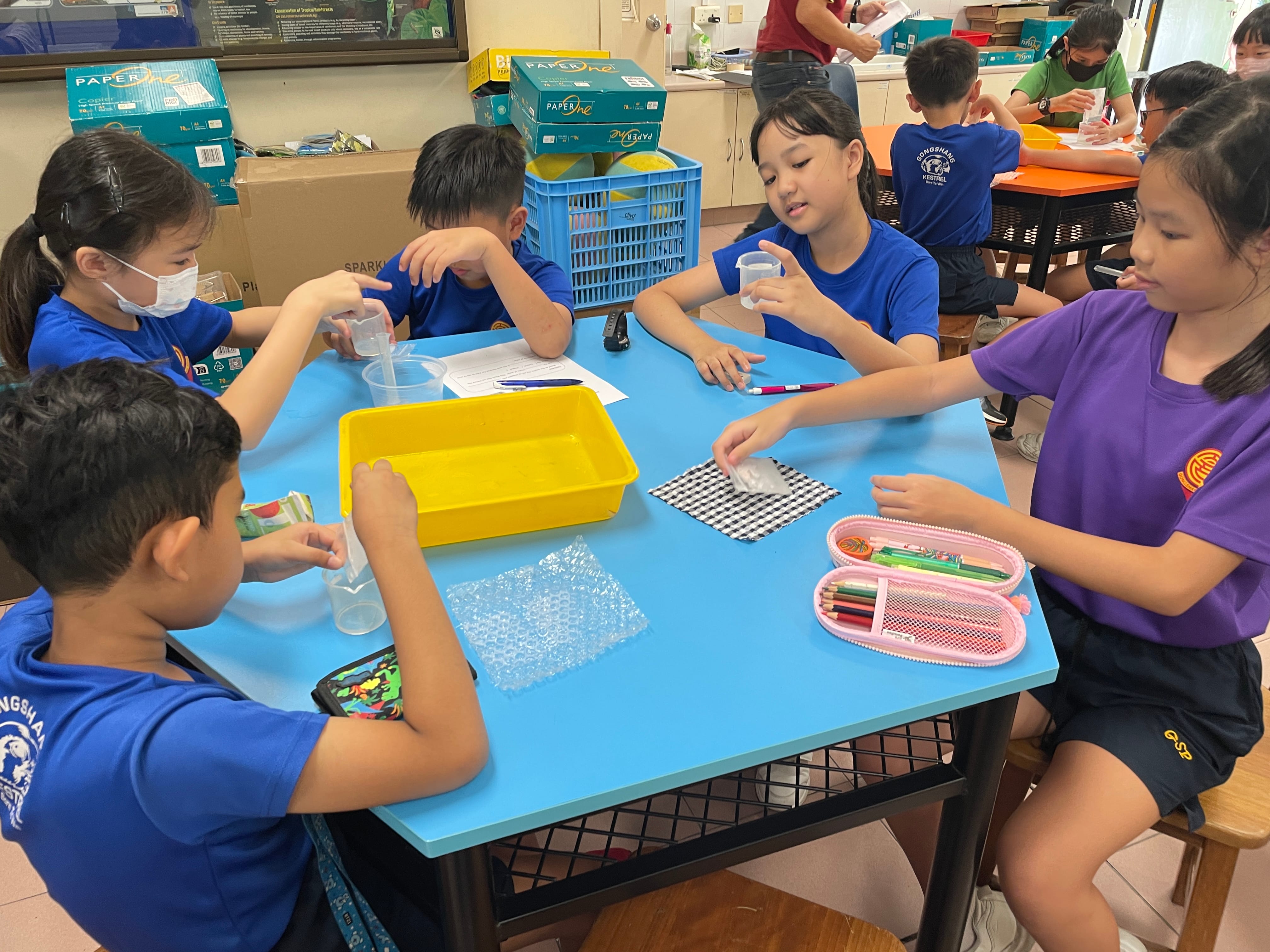 Students measure temperature and volume