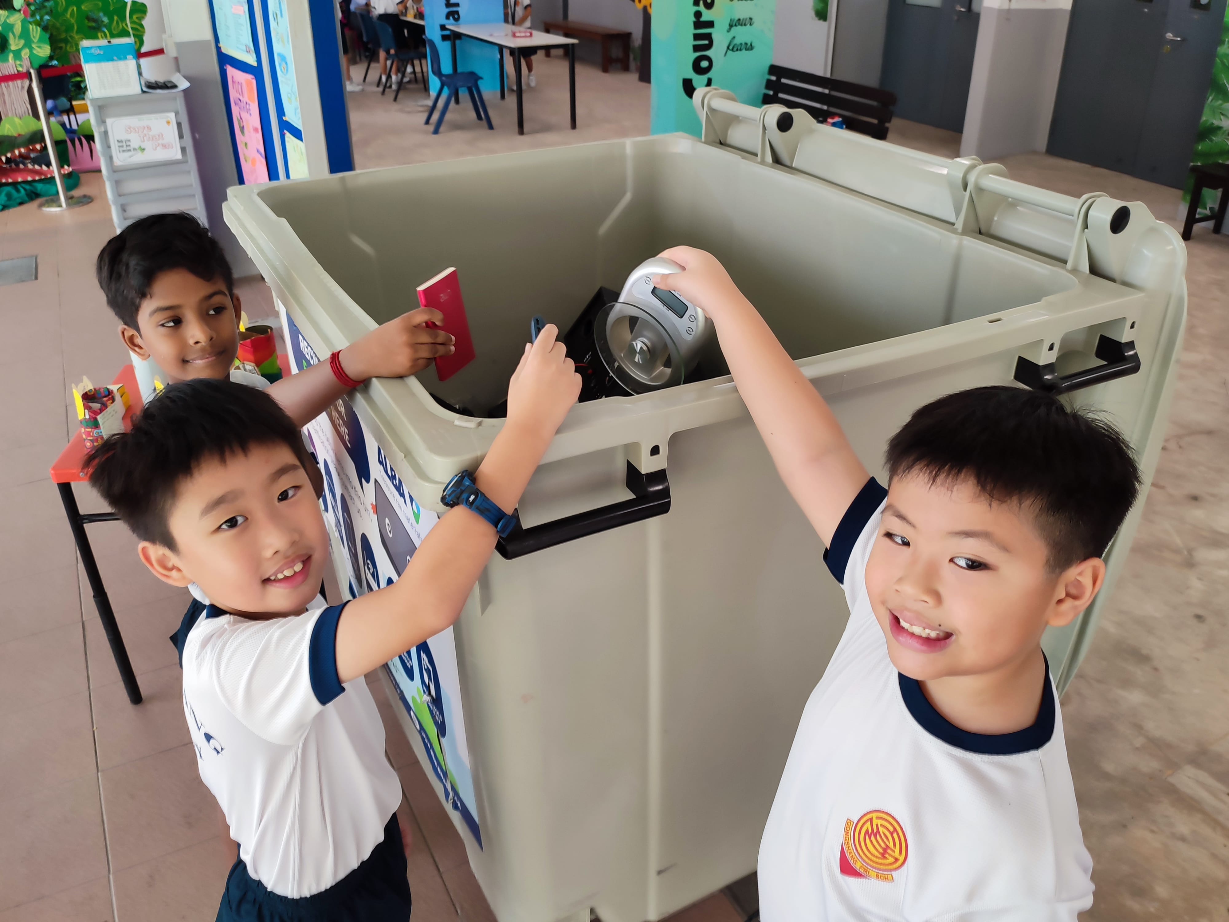 Students disposing e-waste properly