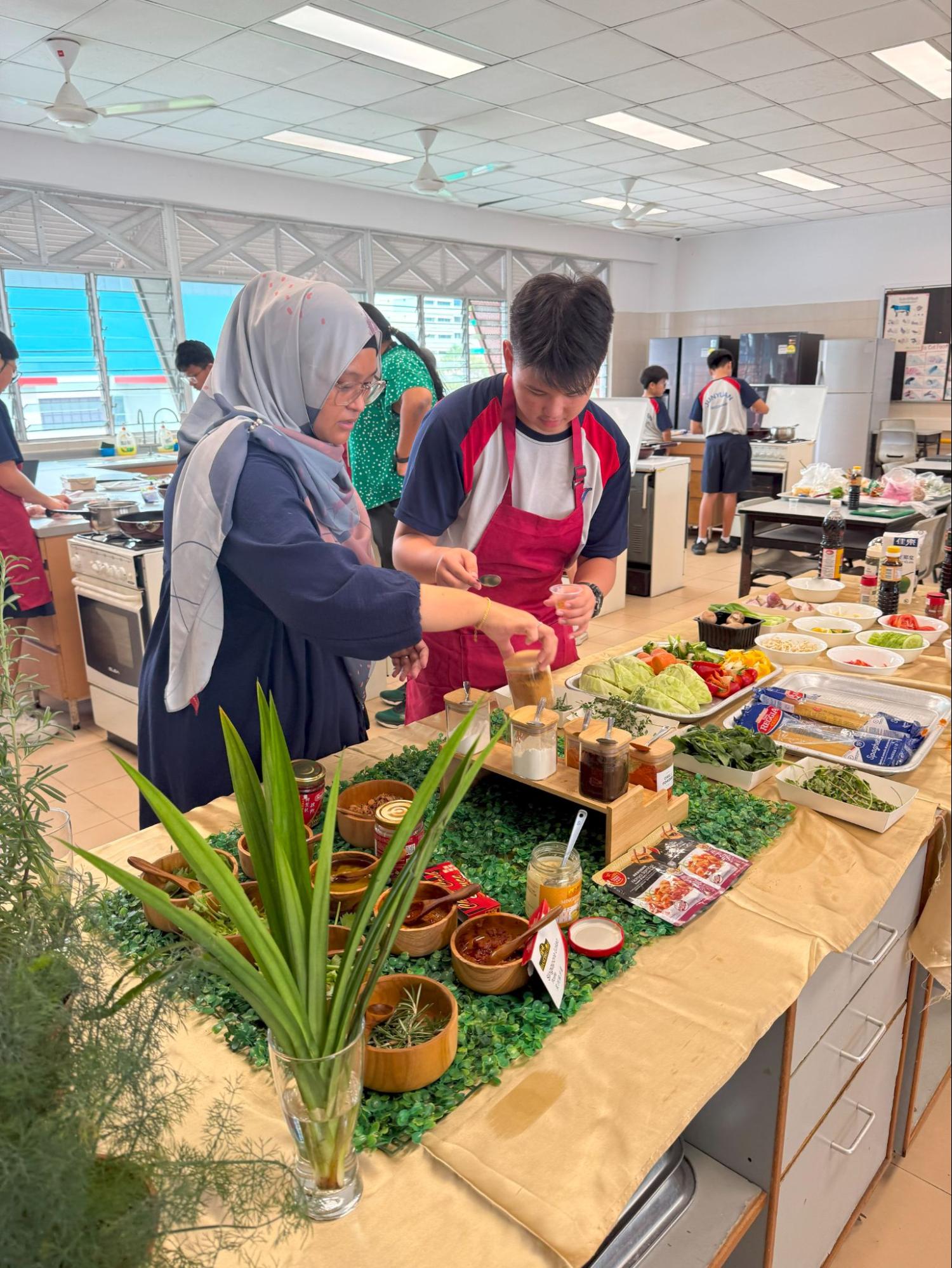 A teacher teaching a student on the ingredients shown