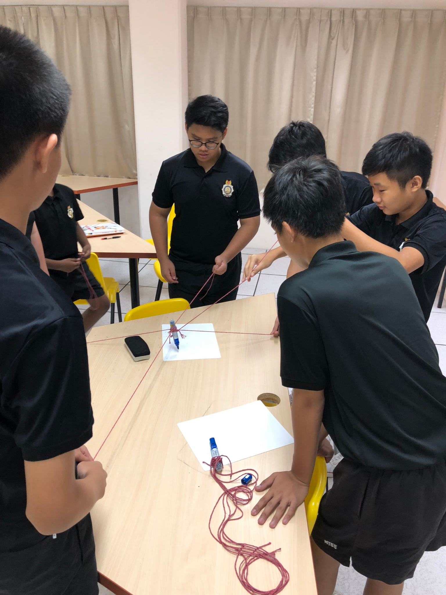 NCC students doing team-building activities together.