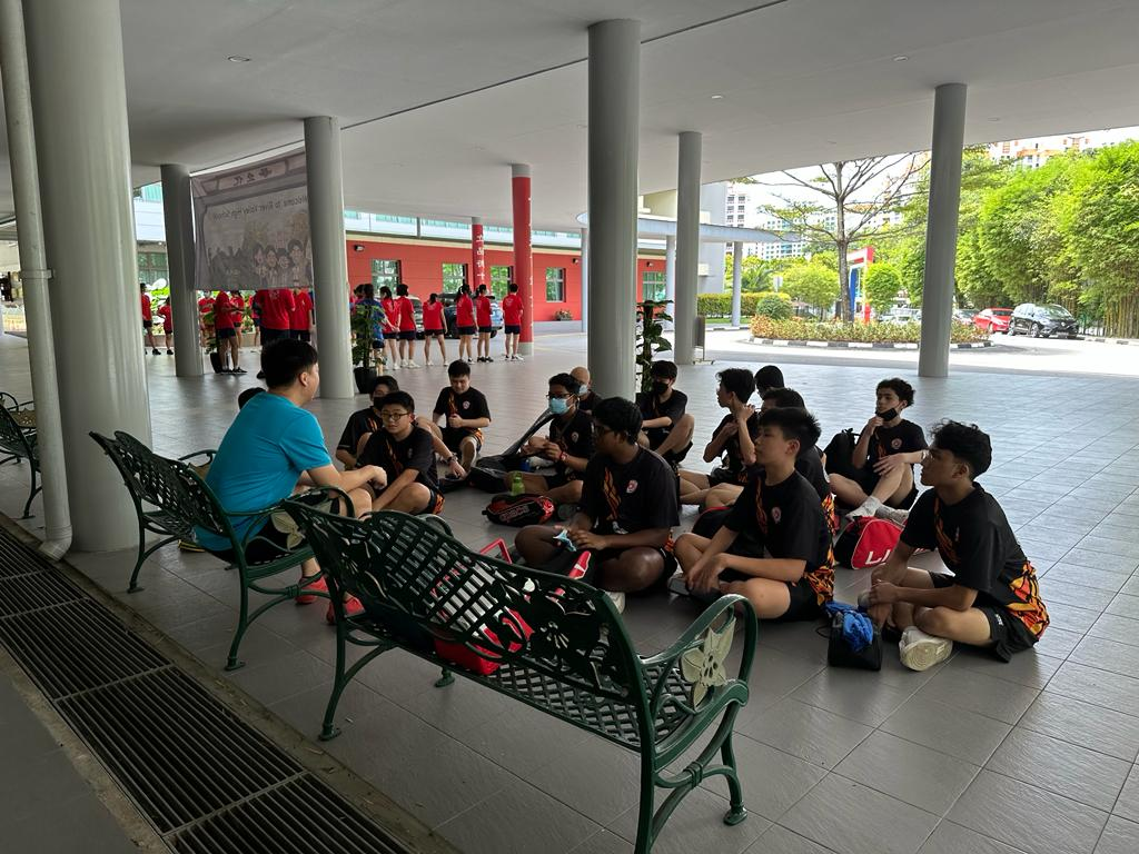 Badminton Boys team debriefing after a competition.