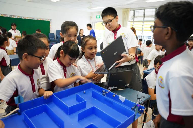 Students gathering for a project exhibition
