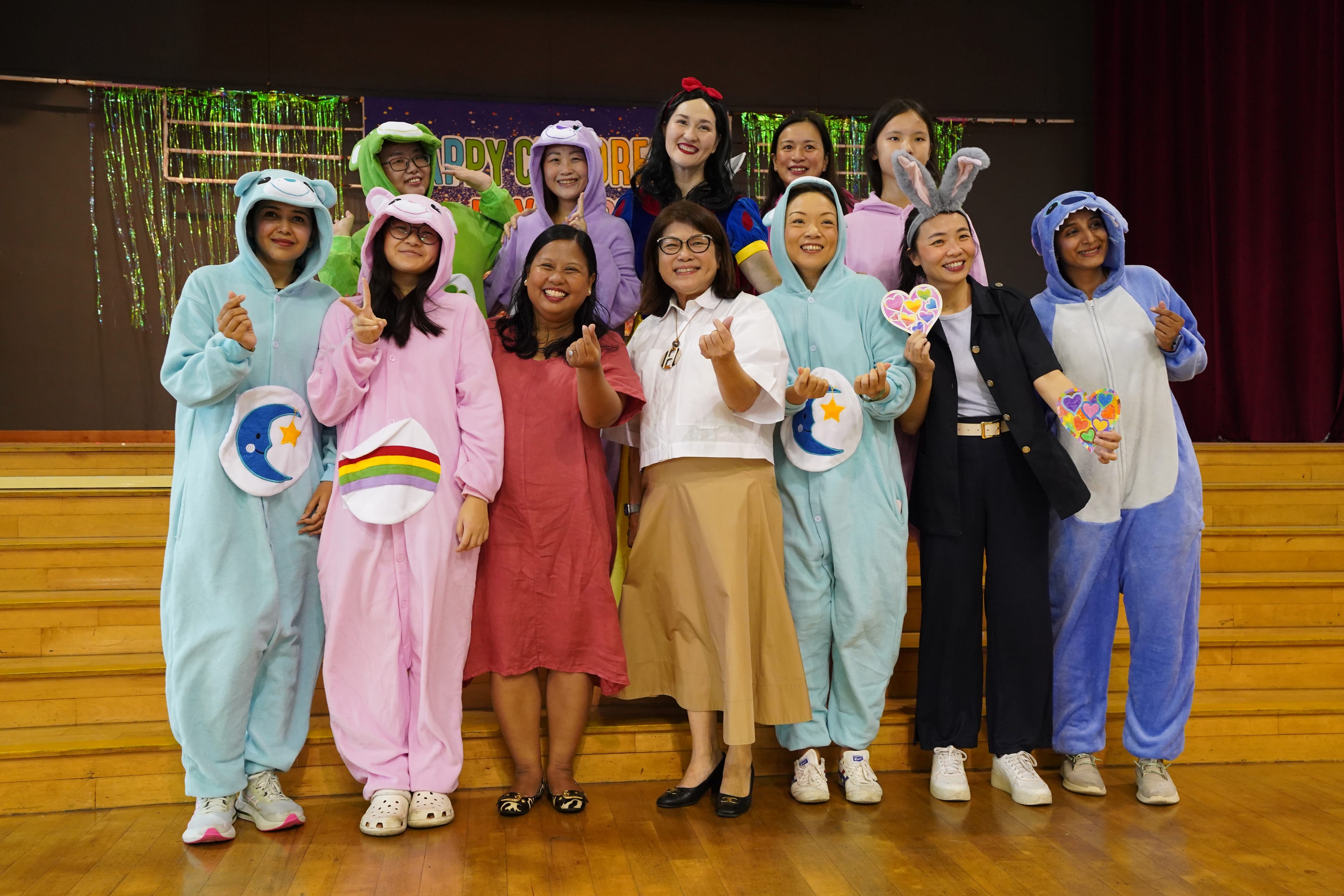 Photo of a group of parent volunteers dressed up as storybook characters